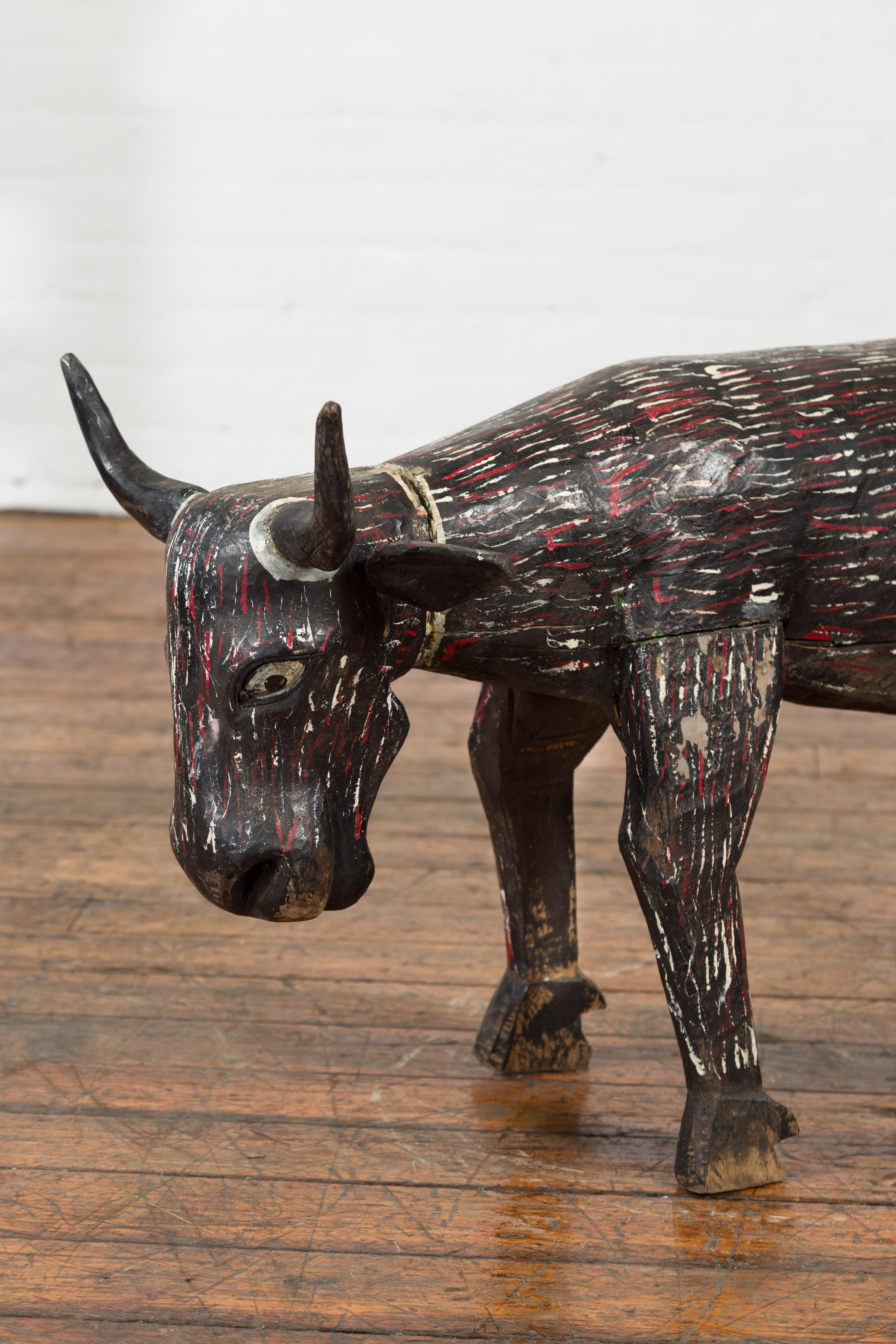 Hand-Carved Indian Early 20th Century Hand Painted Wooden Cow with Distressed Patina For Sale