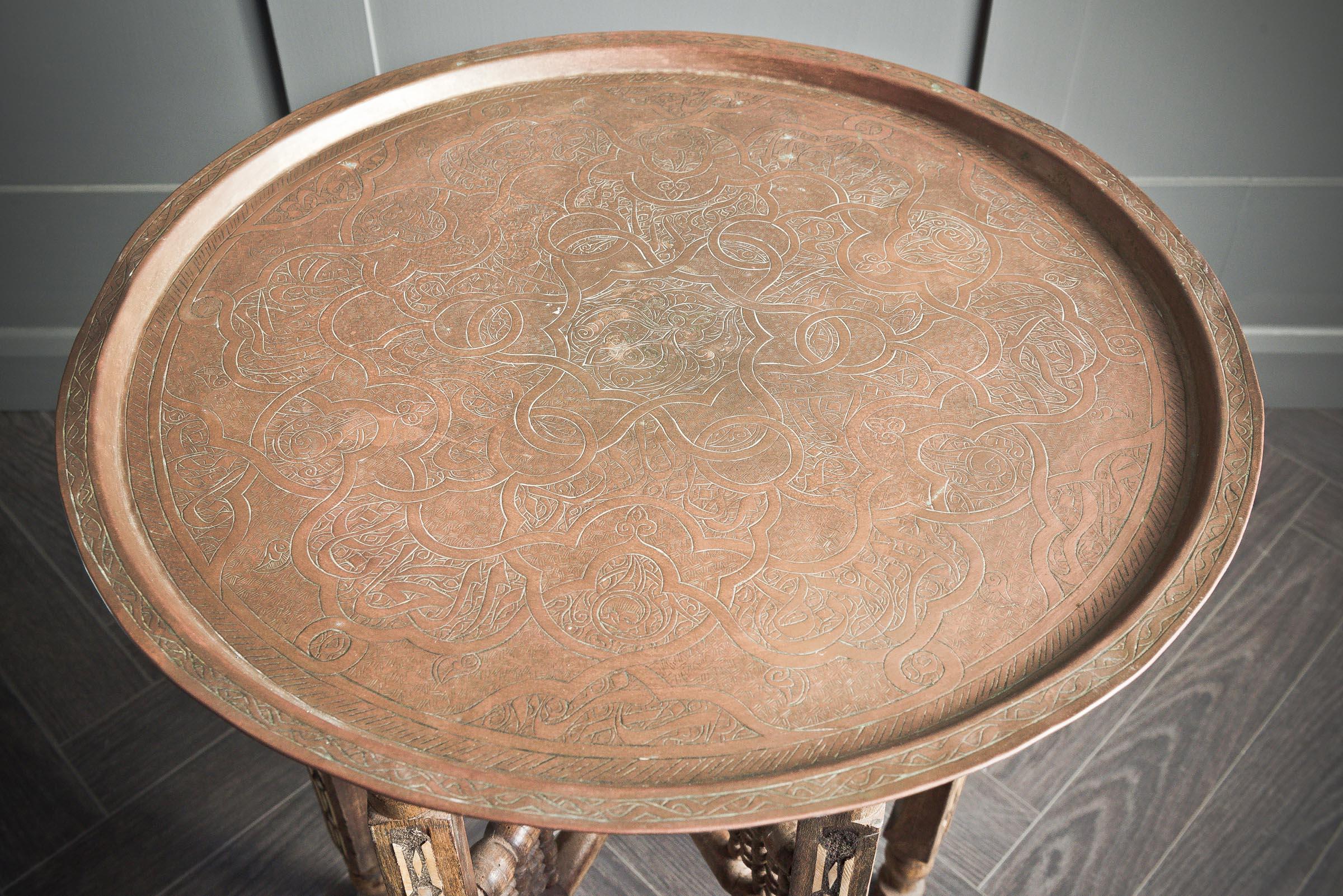 Indian folding console table with engraved copper top.