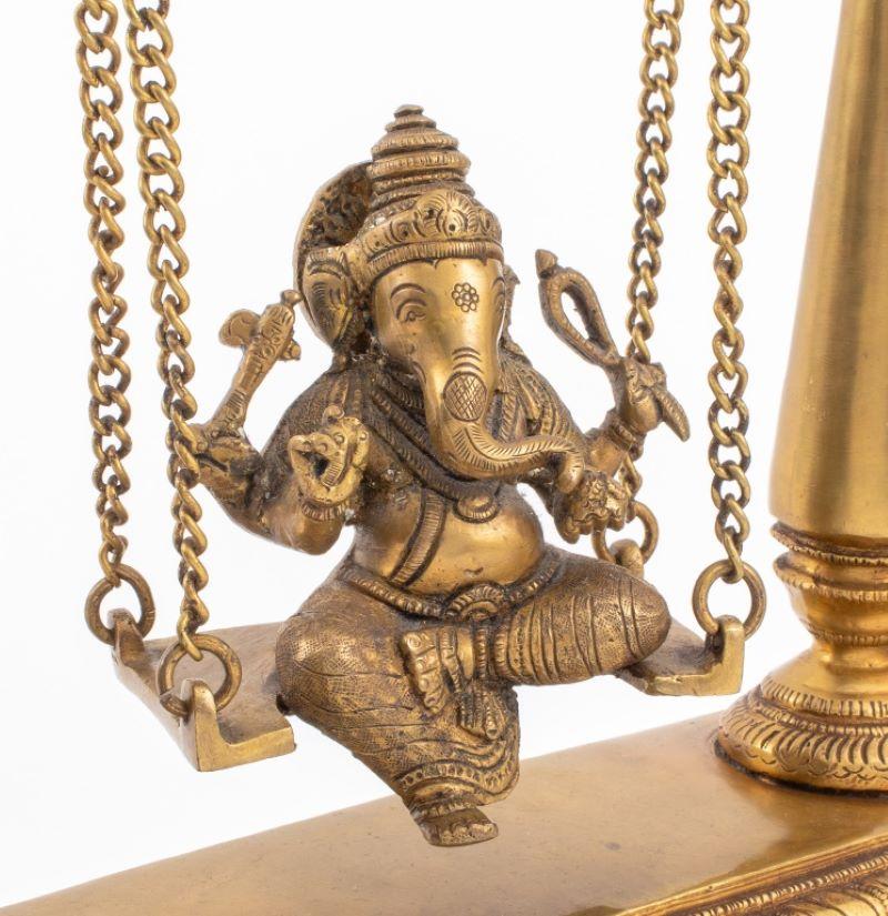 Indian Gilt Bronze Ganesha on Swing Sculpture In Good Condition For Sale In New York, NY