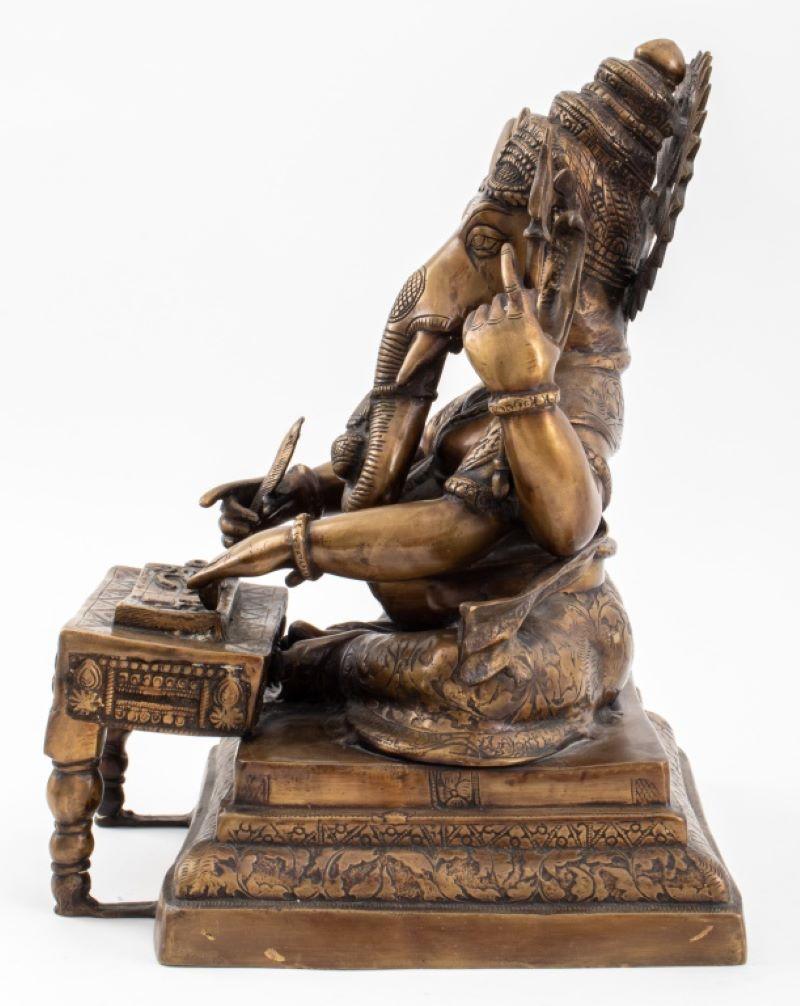 Indian Gilt Bronze Ganesha Sculpture Writing the Mahabharata In Good Condition In Astoria, NY