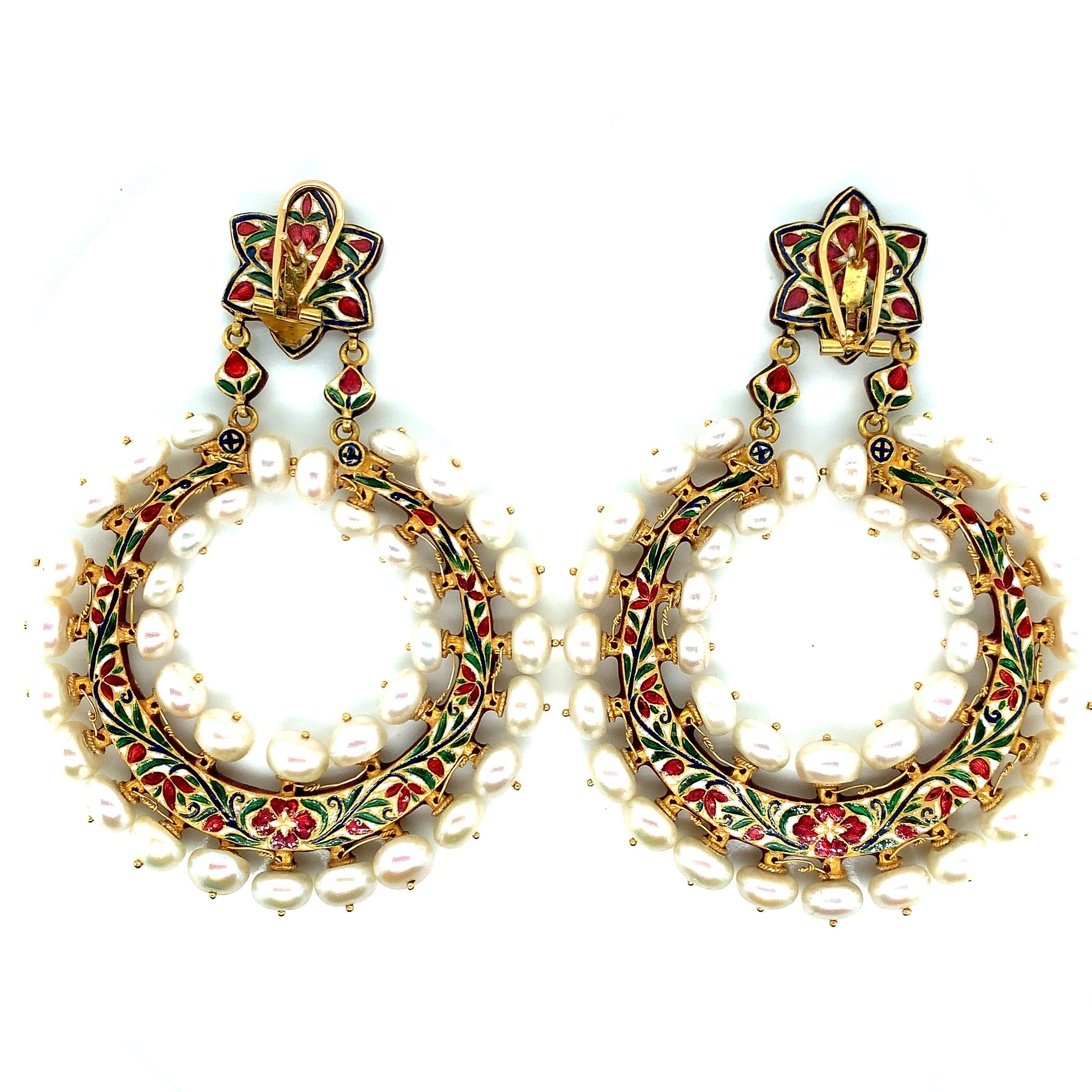A pair of Indian gold, freshwater pearl, foil-backed diamond, and colorful Jaipur enamel hoop pendant-earrings. The doughnut-shaped freshwater pearls measure approximately 7.5 to 6.0 mm. Total weight: 66.6 grams. Width: 2.63 inches. Length: 3.5