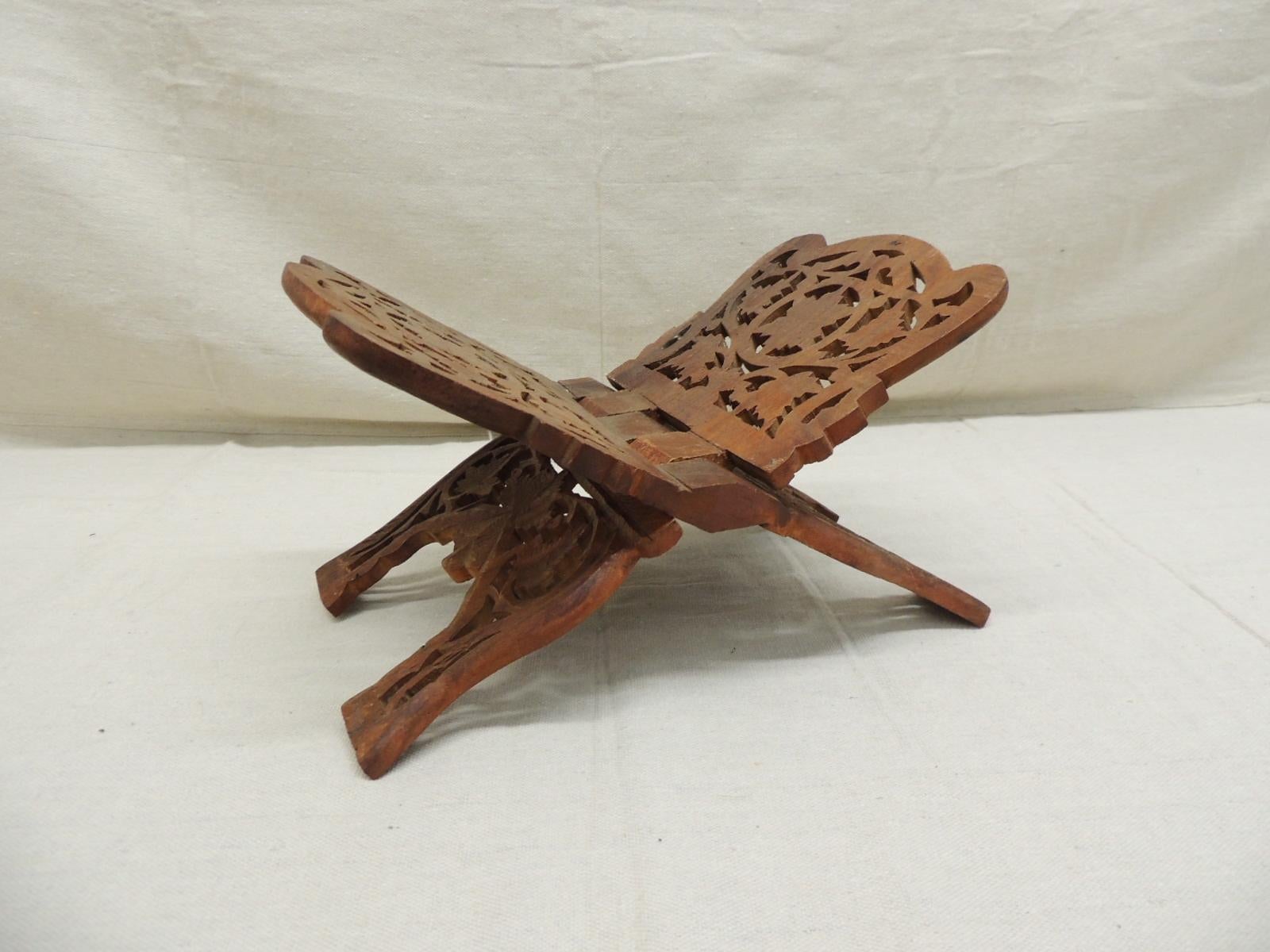 Folding Indian hand carved book display or stand.
Size: 11