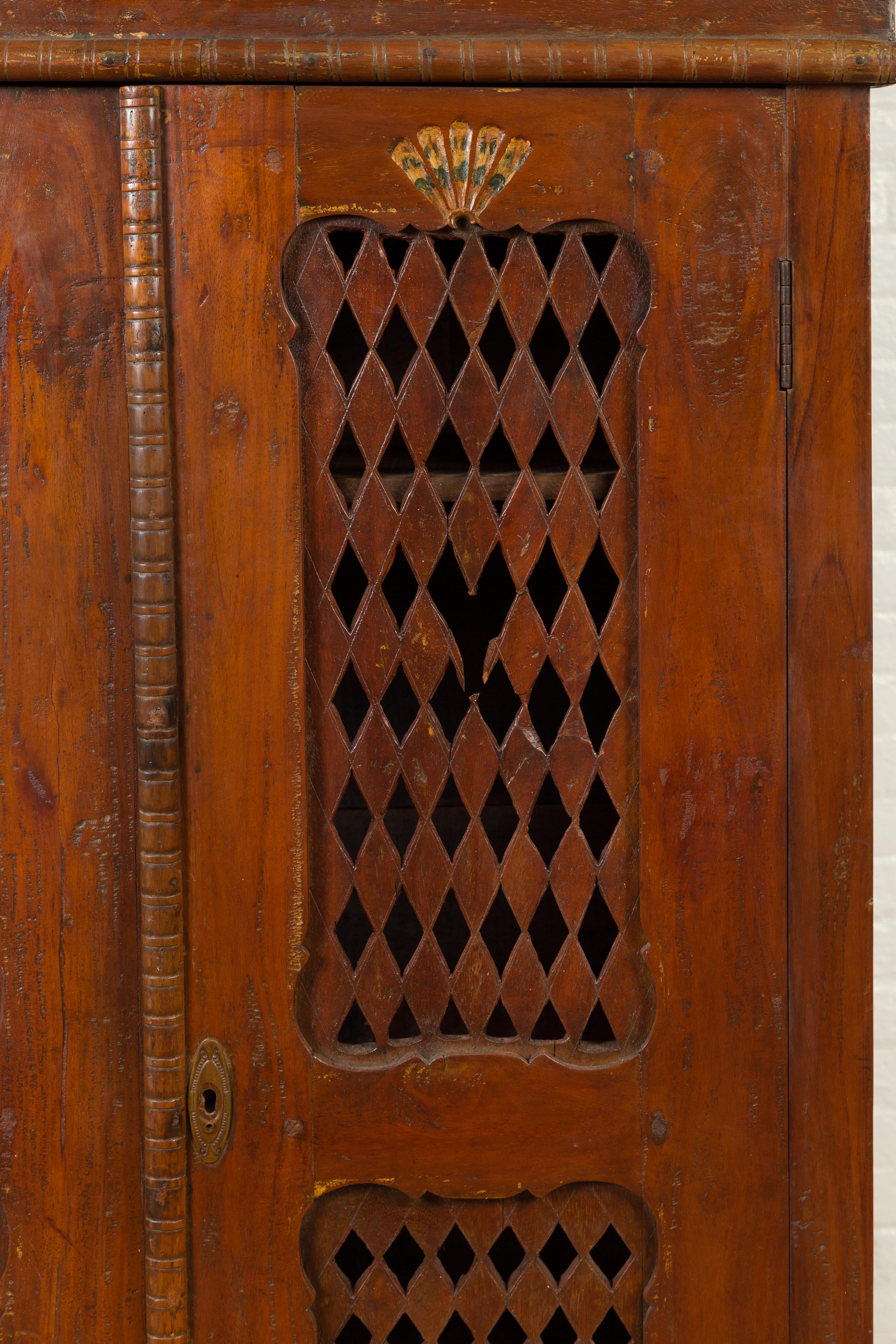 Indian Hand Carved Cabinet with Open Diamond Design and Painted Fan Motifs In Good Condition For Sale In Yonkers, NY