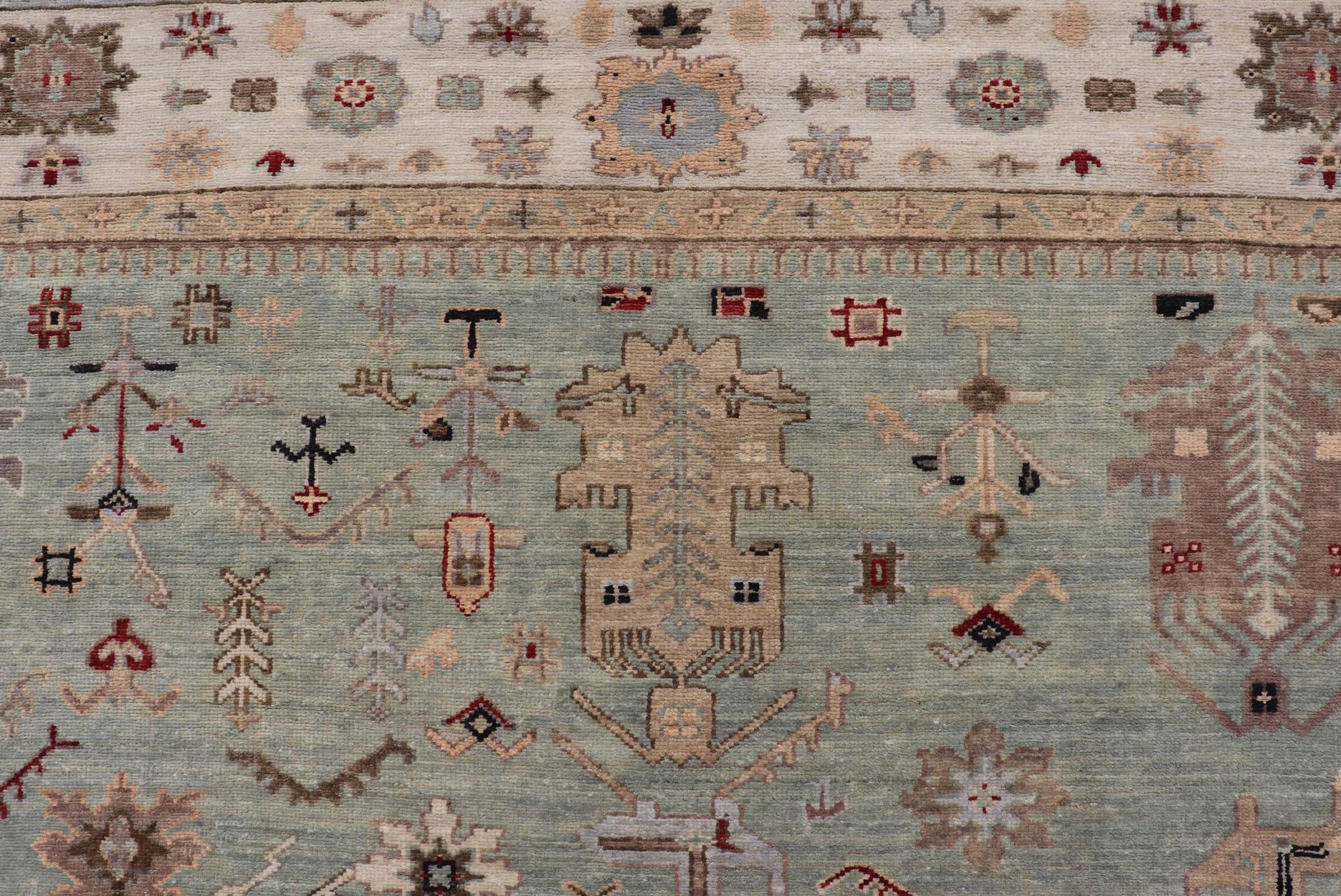 Noué à la main Tapis indien Oushak noué à la main en turquoise, crème et rouge 9'11 x 13'6 en vente