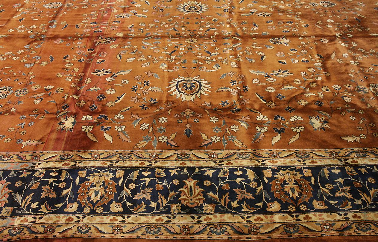 This exquisite antique Indian rug is a stunning representation of the rich textile heritage of India, showcasing the intricate artistry and opulent design that has made Indian rugs highly sought after for centuries. The rug’s rich, warm tones and