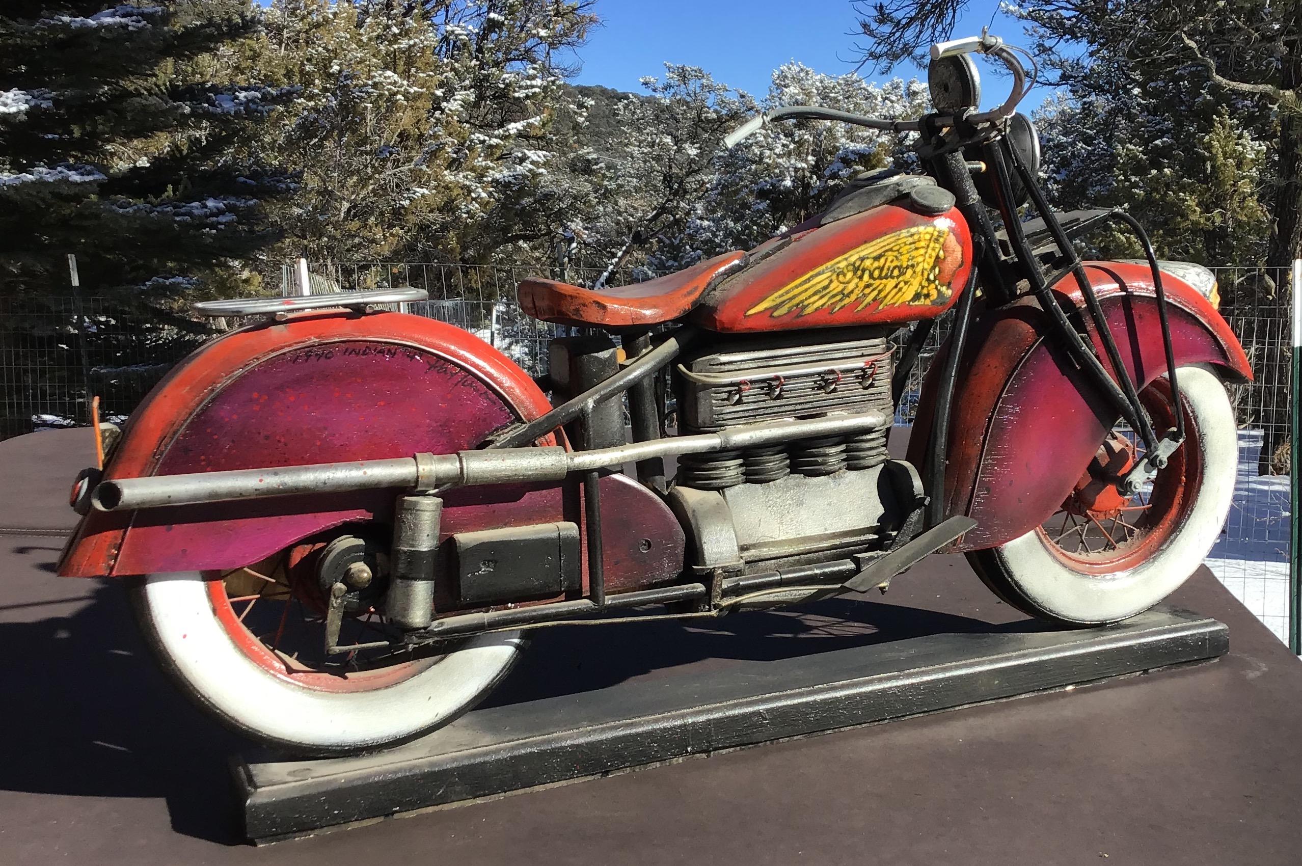 Constructed of wood, paint and some metal mixed media.

Paul Jacobsen used everyday objects, such as chairs, cars, airplanes, trains, motorcycles and puzzles, all built from scratch, and turns them into haunting and very desirable works of art.