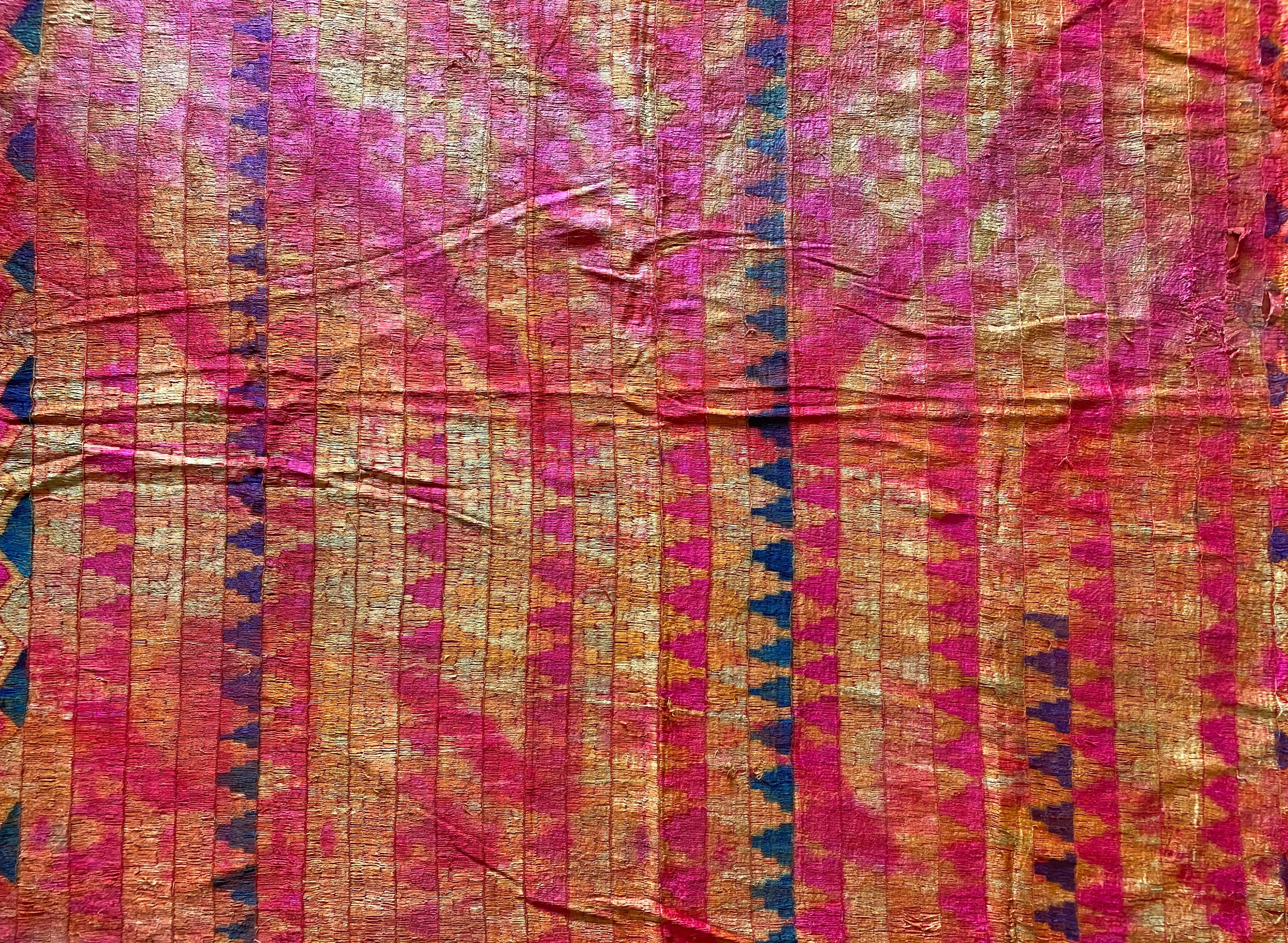 This strikingly coloured Phulkari is from Punjab, India. It was hand-crafted from silk and cotton, with silk being used for the embroidery. Phulkari’s are a form of wedding shawl and are used by bride’s amidst marriage ceremonies. What makes