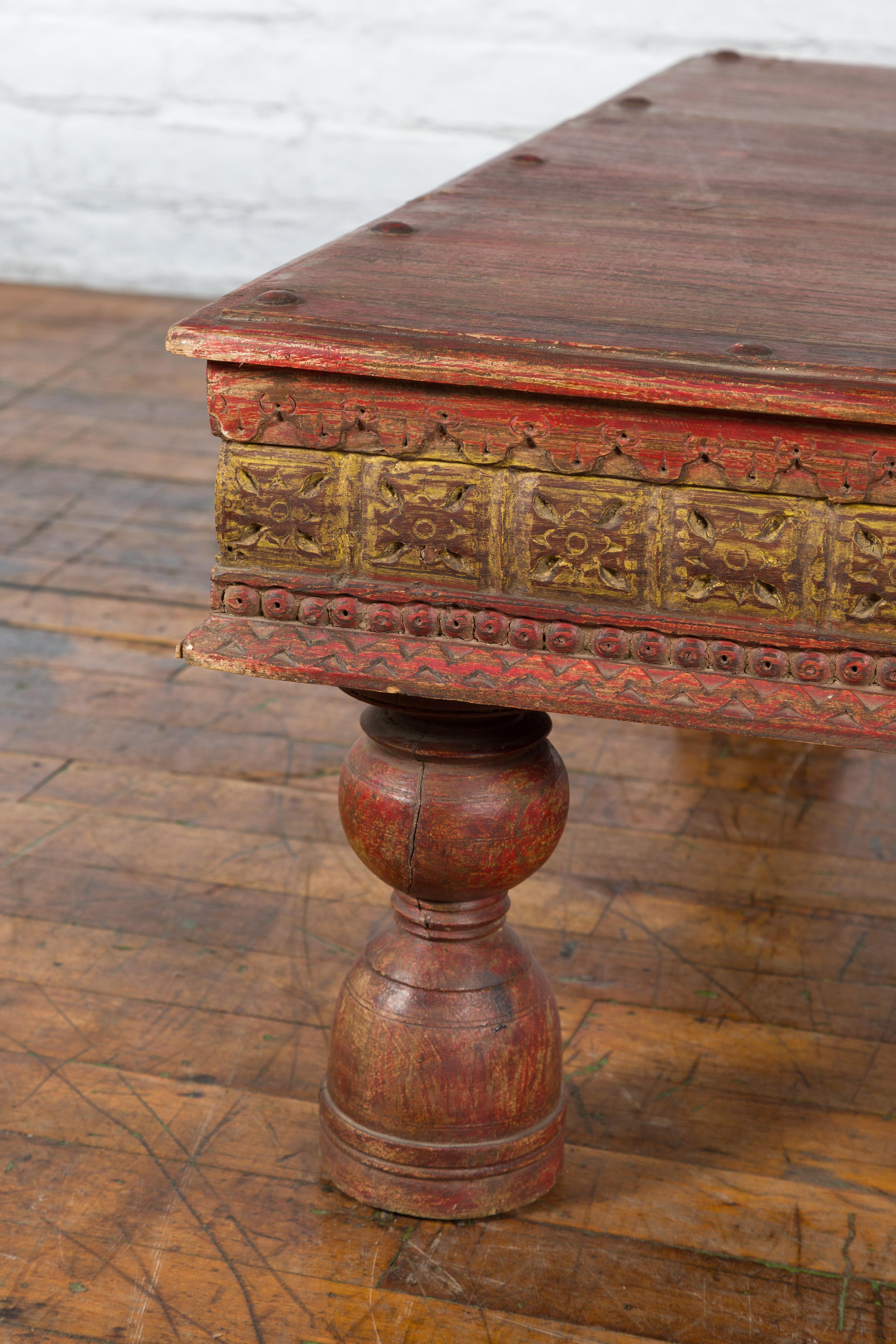 19th Century Indian Primitive Low Carved Wooden Coffee Table with Polychrome Accents For Sale
