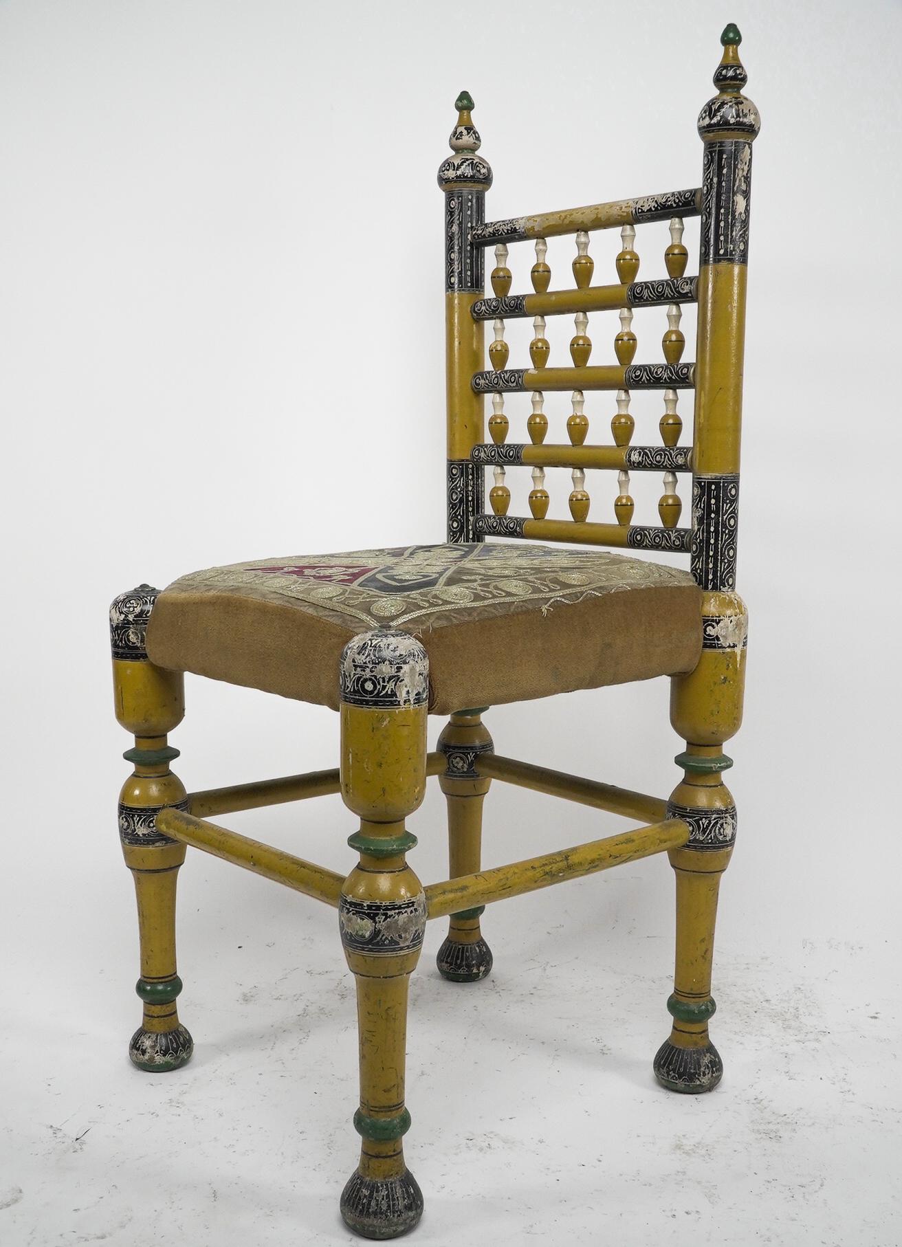 Early 20th Century Indian Rajasthani A pair of polychrome painted chairs with gilt chord embroidery For Sale