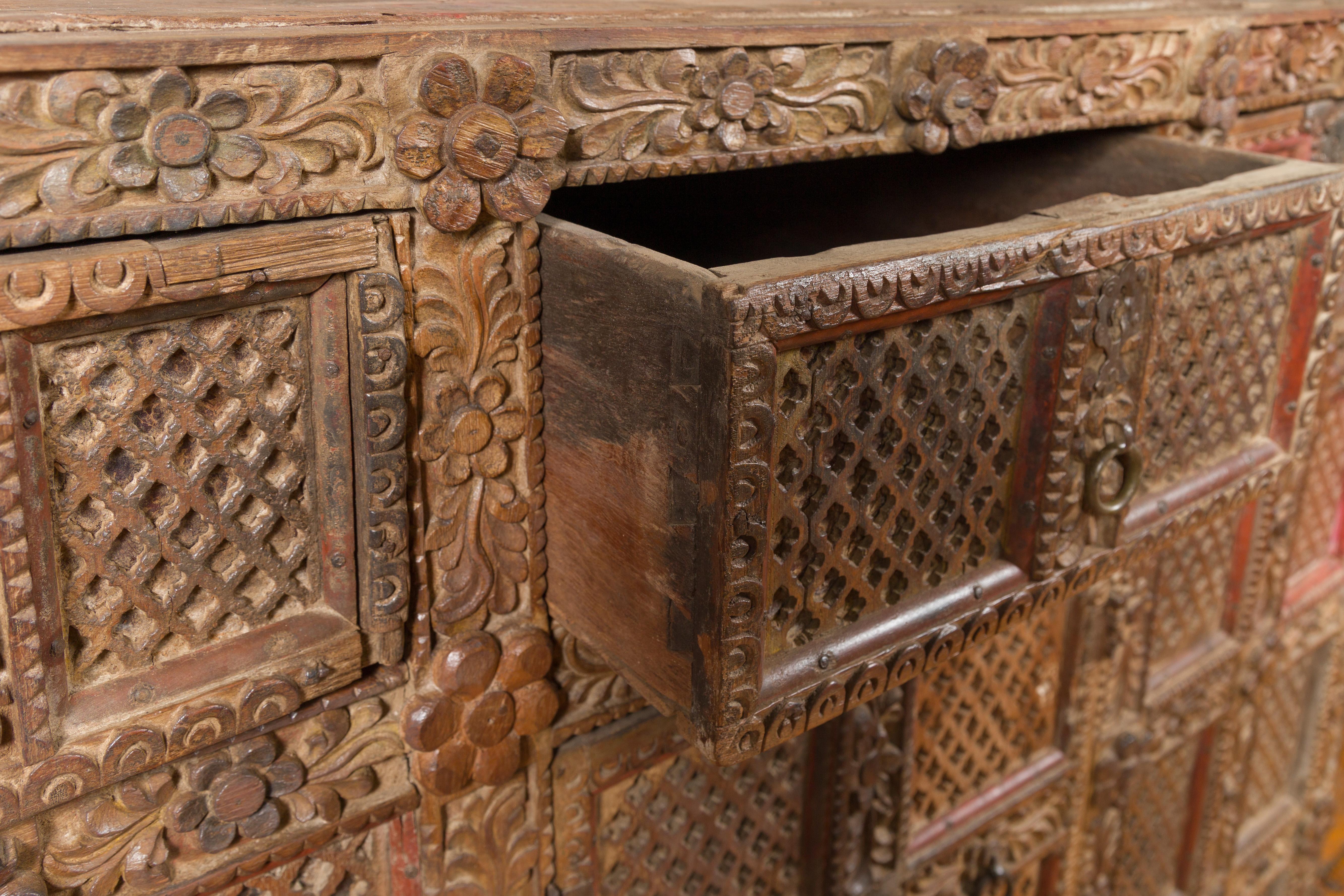 Indian Rubbed Wood Palace Cabinet with Carved Floral Decor and Red Patina 7