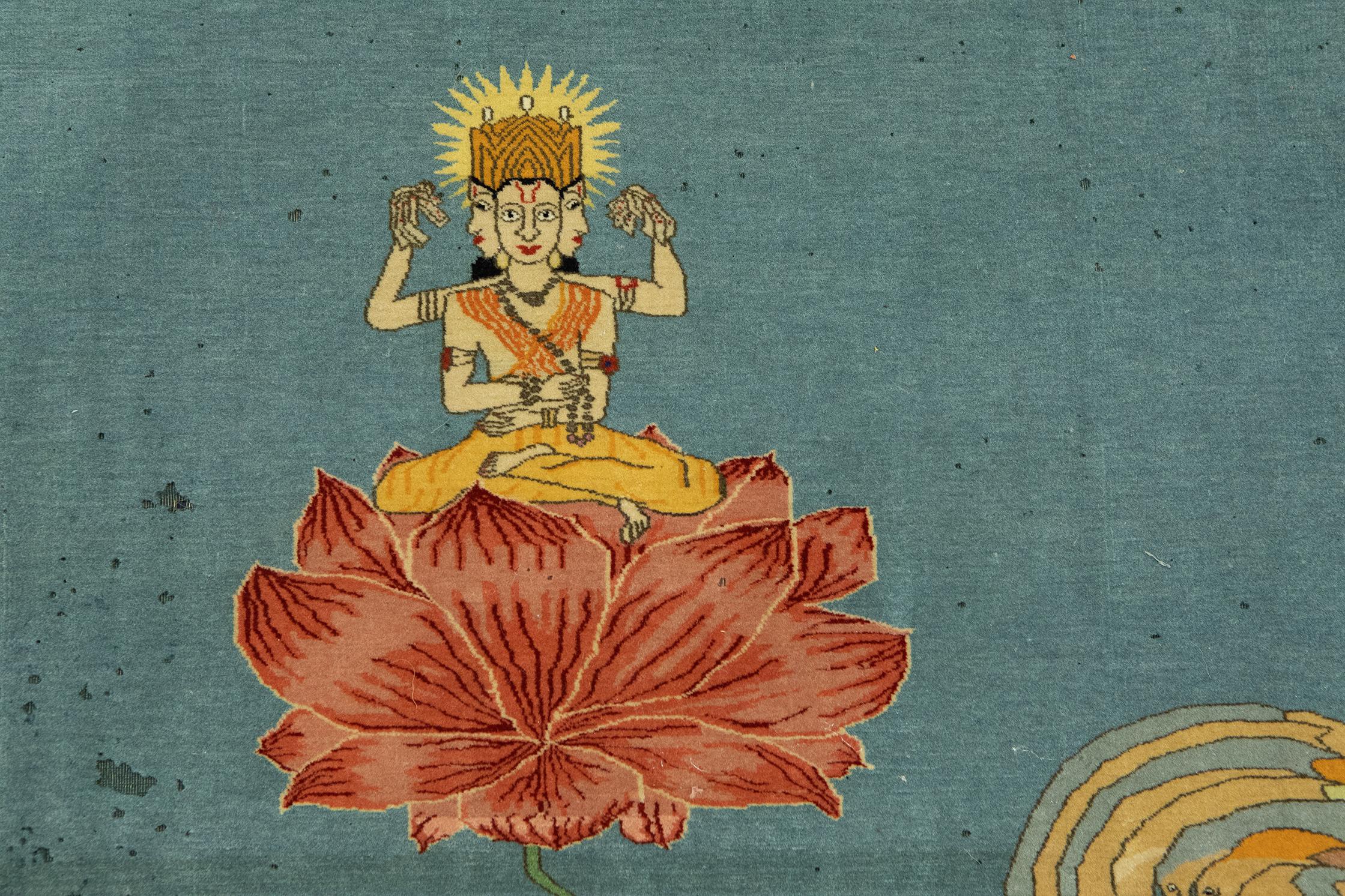 This Indian Rug Pashmina measuring 47 × 58 cm showcases an extremely finely woven pictorial carpet, with c. 2,500,000 knots/sqm, depicts Vishnu under a lotus flower resting in cosmic sleep on Shesha, the snake floating on the ocean. With some moth