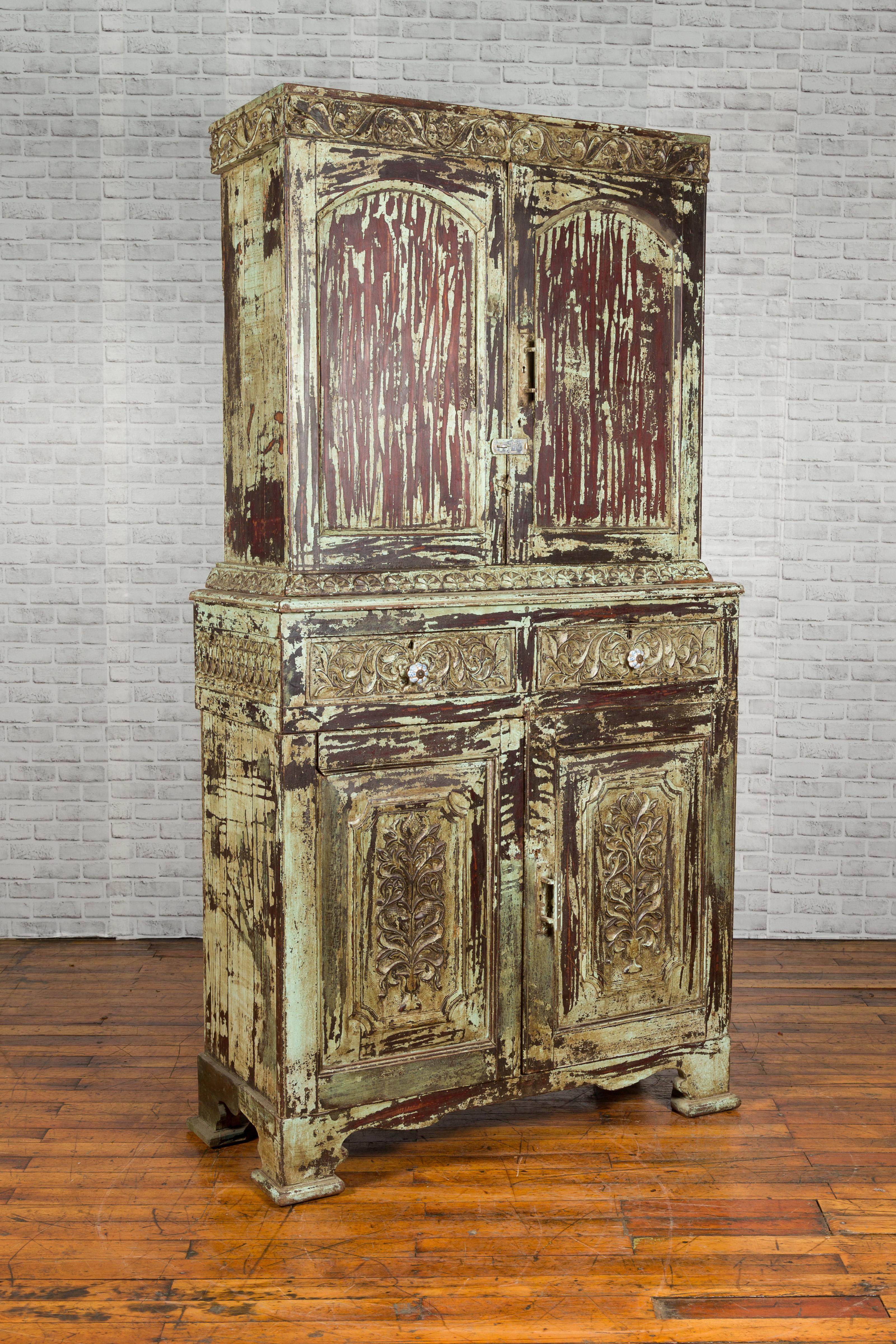 distressed carved wood cabinet