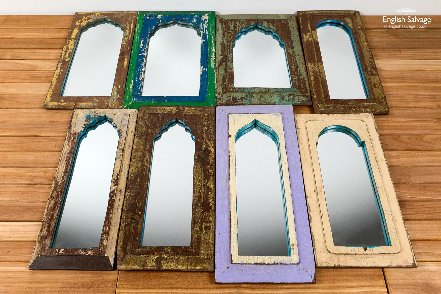 Indian mirrors with a distressed painted finish and arch detail. Sizes of each vary 19.5 - 22cm wide x 48 - 52cm high. All have a hanging hook on the reverse. Splits and dings as expected with reclaimed wood.
