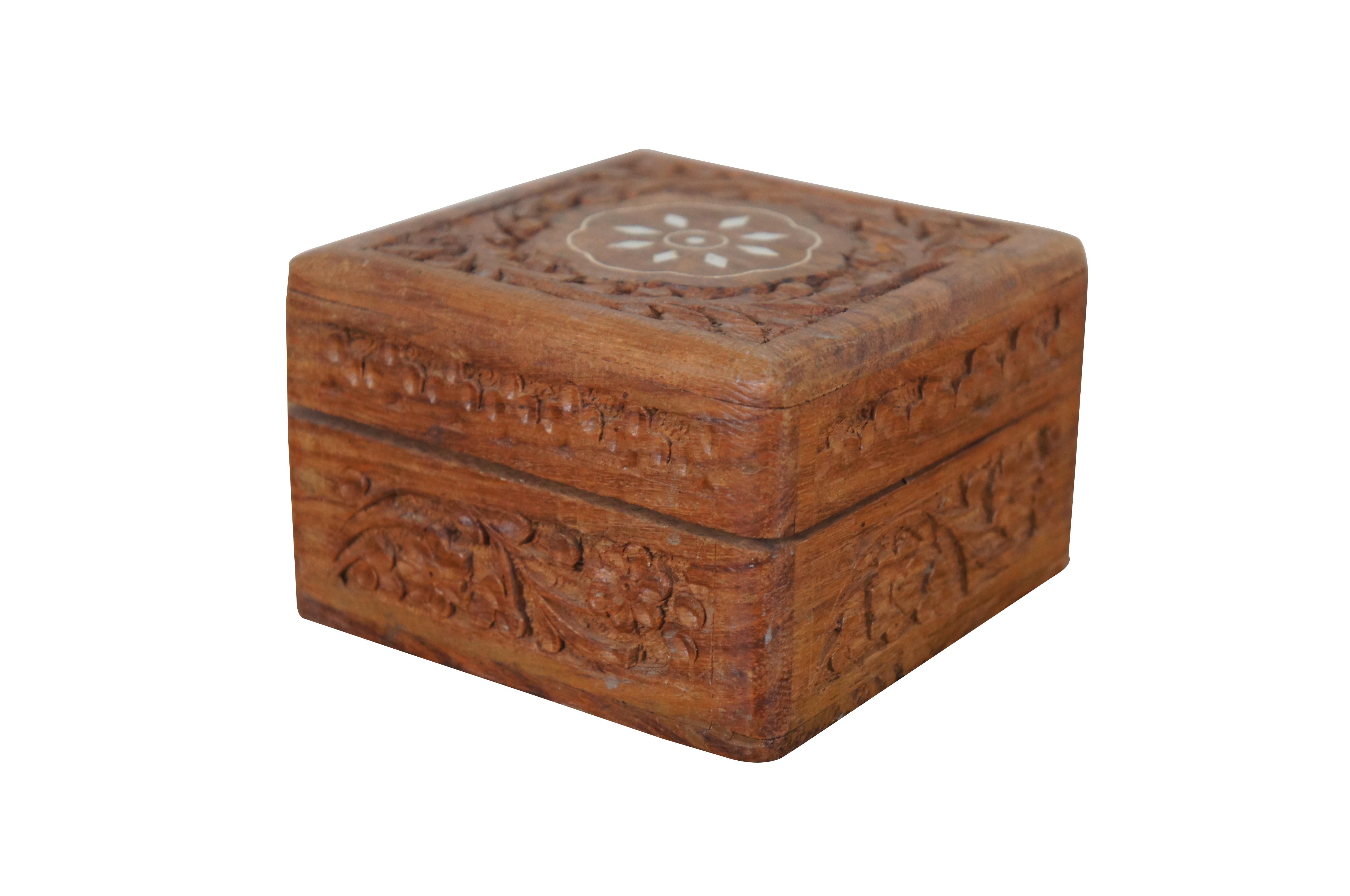 Vintage Sheesham wood / Indian Rosewood hinged jewelry / keepsake / trinket box featuring square form with carved floral and inlaid accents.

Dimensions:
4