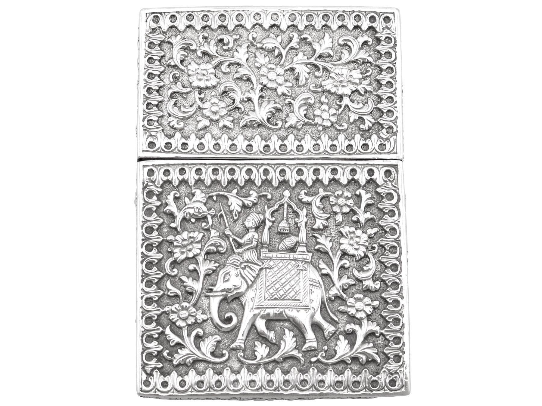 An exceptional, fine and impressive antique Indian silver card case; an addition to our diverse Asian silverware collection.

This exceptional antique Indian silver card case has a shaped rectangular form.

The surface of this case is