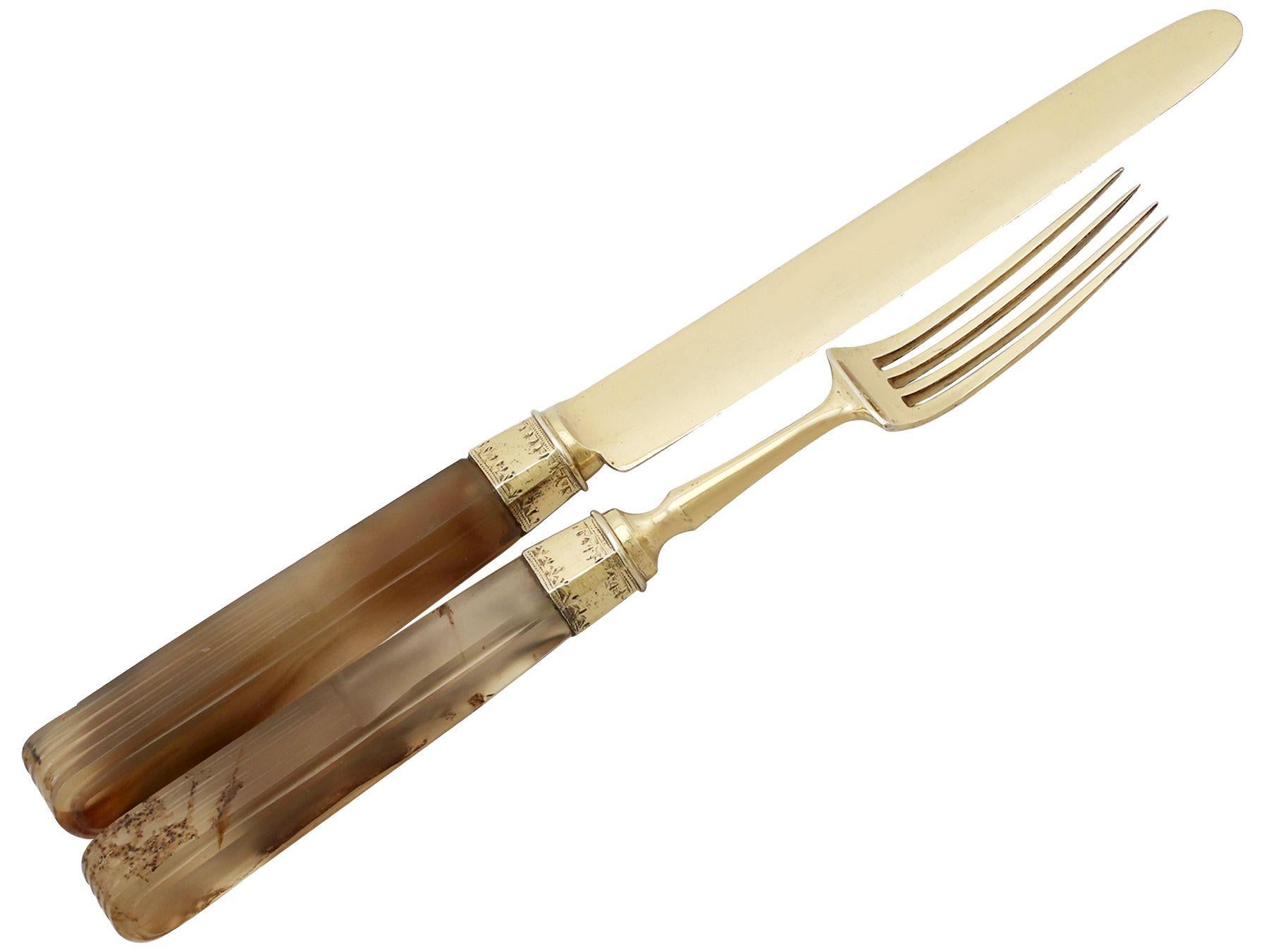 An exceptional, fine and impressive pair of antique Indian silver gilt and agate handled travelling knife and fork set, boxed; an addition to our silver flatware collection

This exceptional antique Indian silver gilt and agate handle knife and
