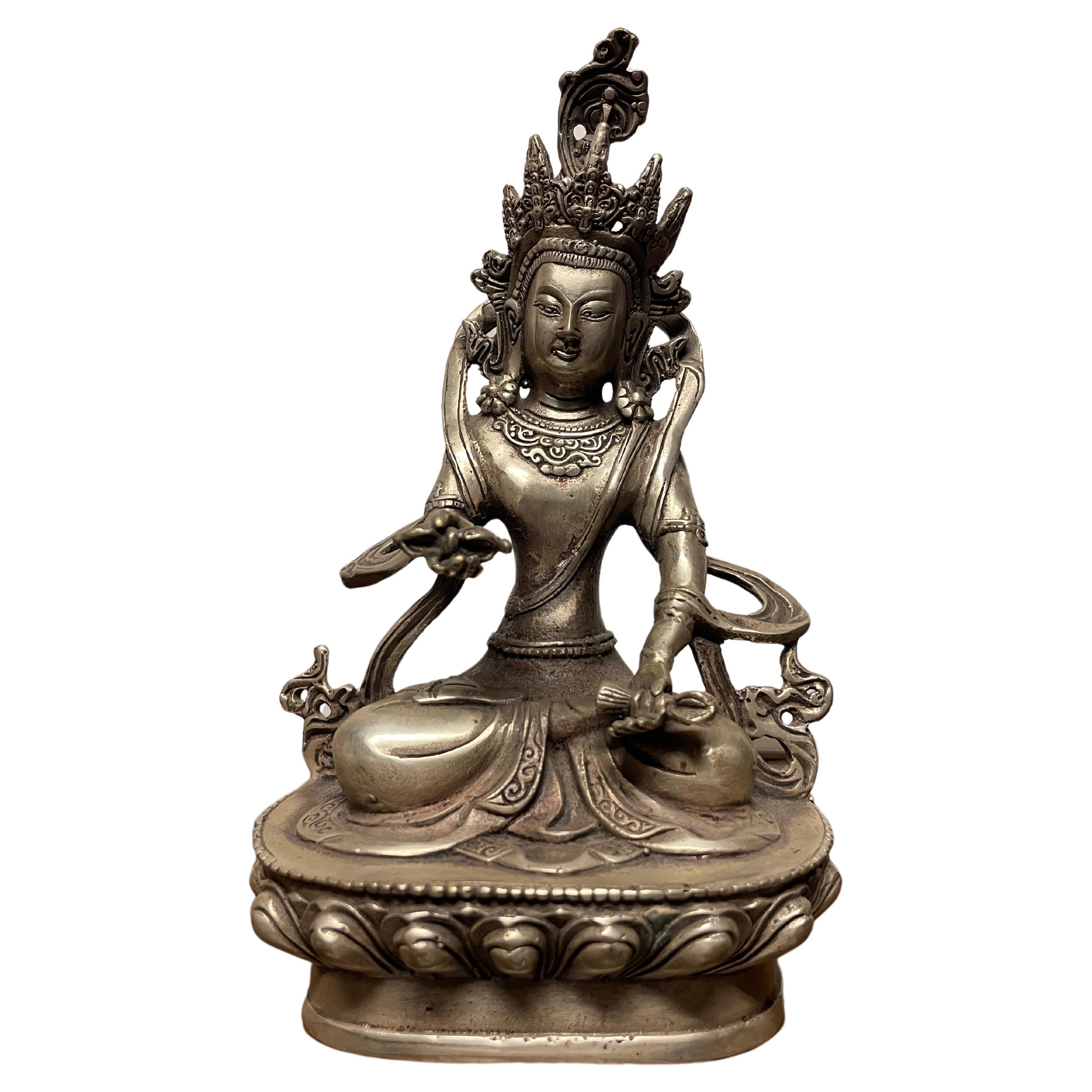 Vajradhara, divinité bouddhiste indienne assise en position de lotus en bronze argenté