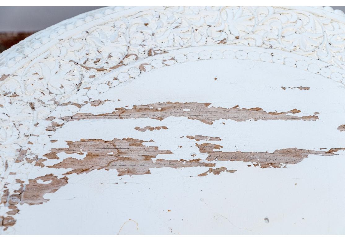 Indian Style Ornately Carved Paint Decorated Pedestal Occasional Table In Distressed Condition For Sale In Bridgeport, CT