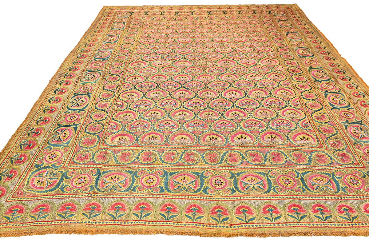 This stunning Deccani silk textile from India, measuring 340 × 255 cm, is a vibrant testament to the region’s rich cultural and artistic heritage. Likely originating from the Deccan Plateau, a historic crossroads of Indian, Persian, and Islamic
