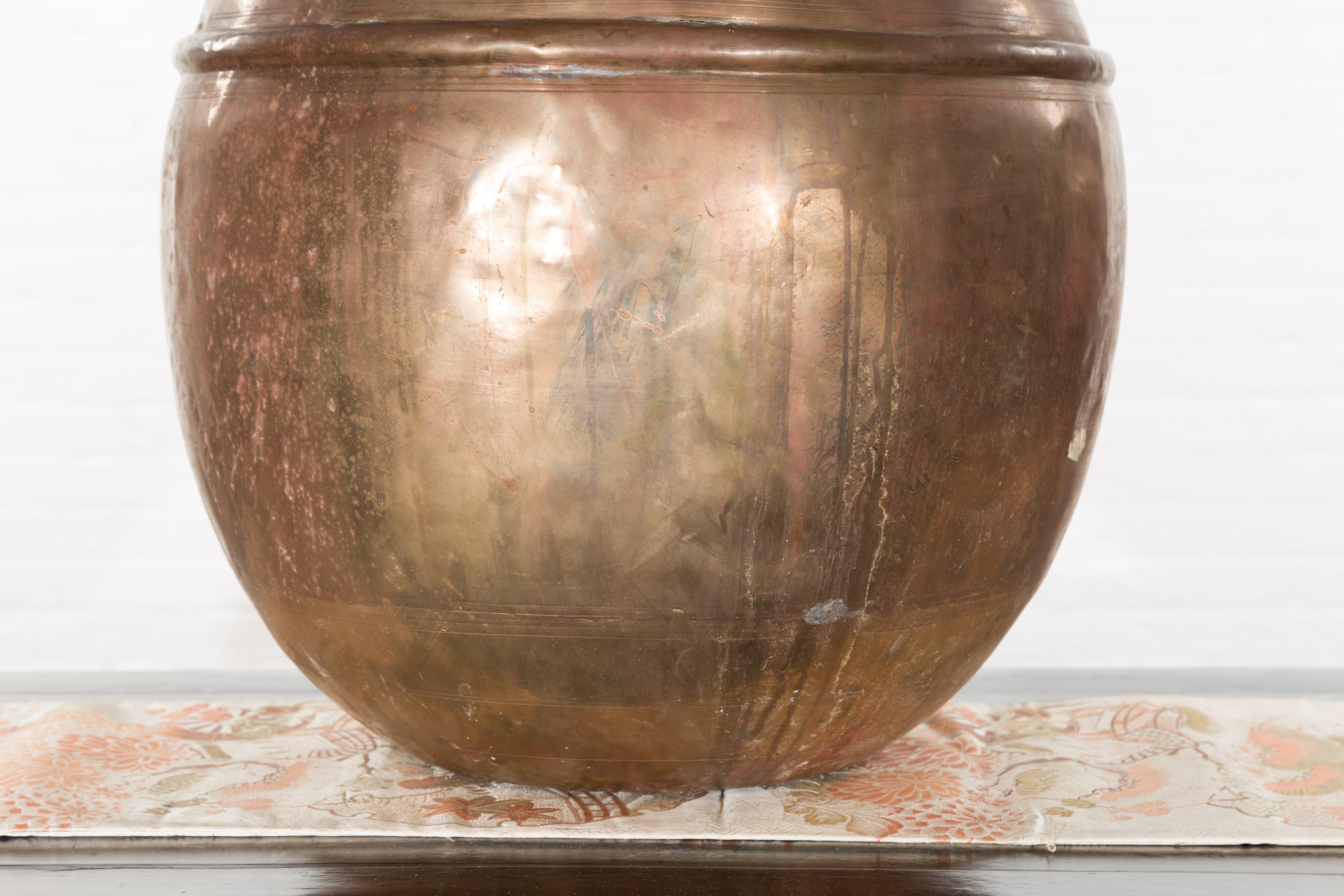 Indian Vintage Brass Water Jar with Concentric Rings and Distressed Appearance 6