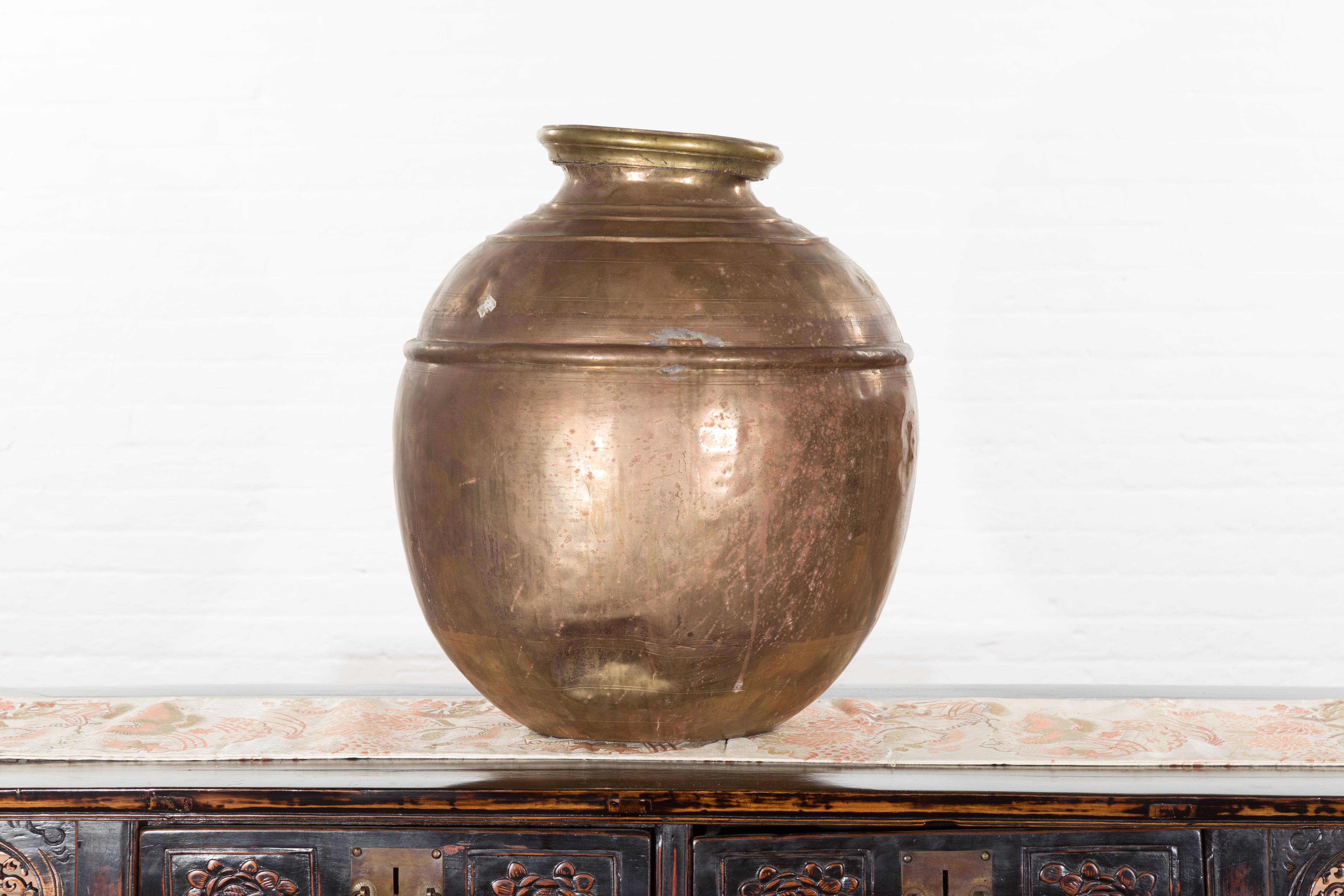 Indian Vintage Brass Water Jar with Concentric Rings and Distressed Appearance 7