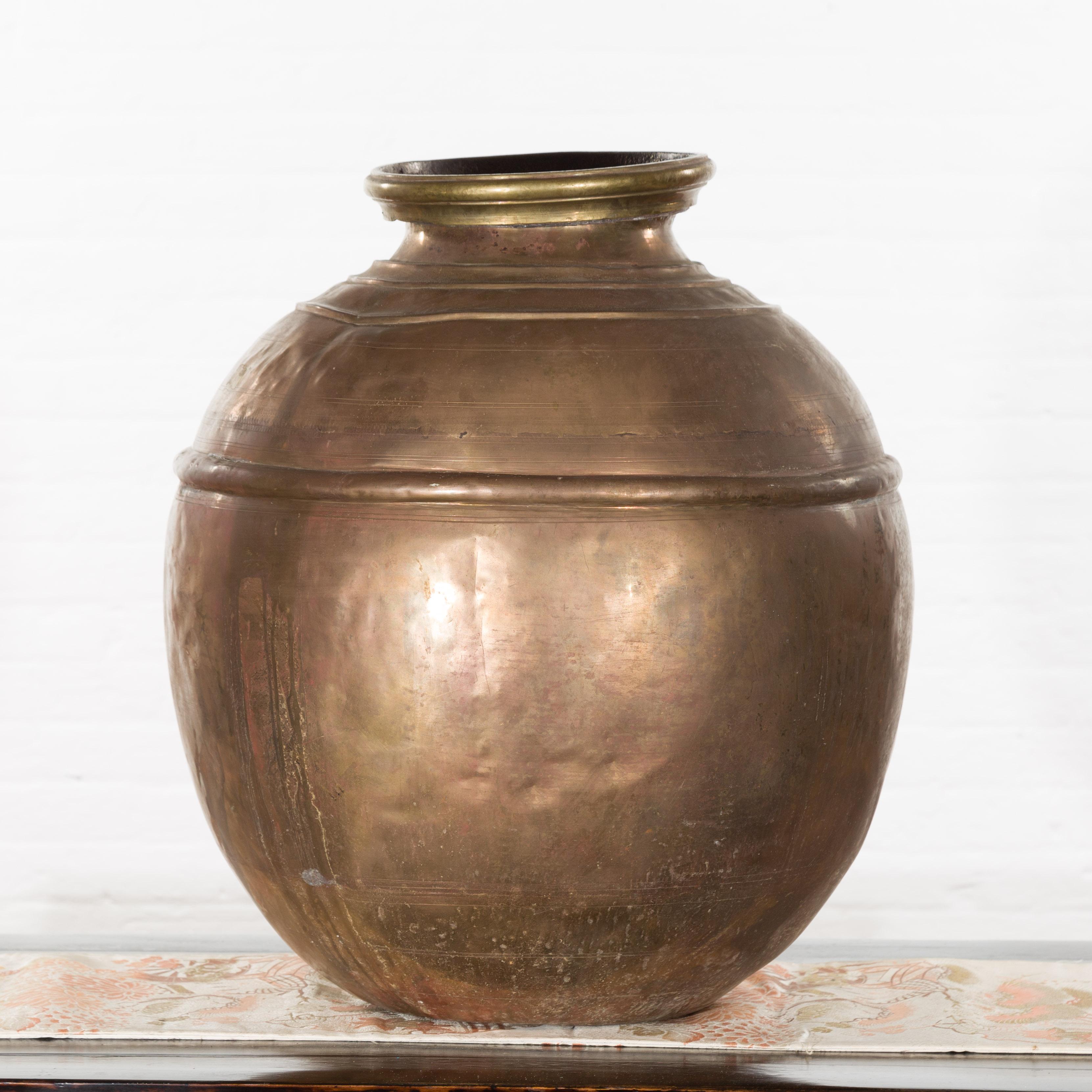 Indian Vintage Brass Water Jar with Concentric Rings and Distressed Appearance 9