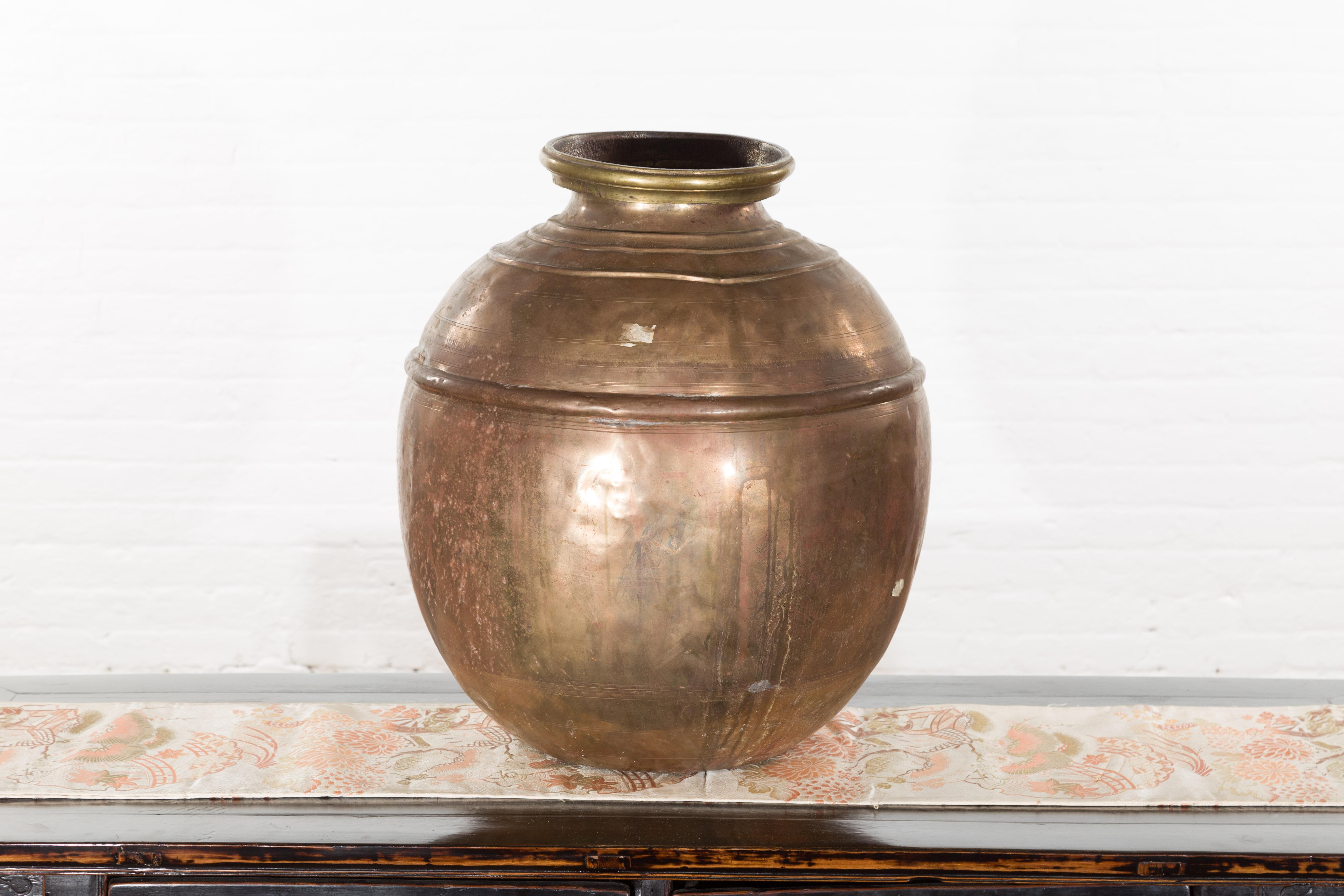 Indian Vintage Brass Water Jar with Concentric Rings and Distressed Appearance 2