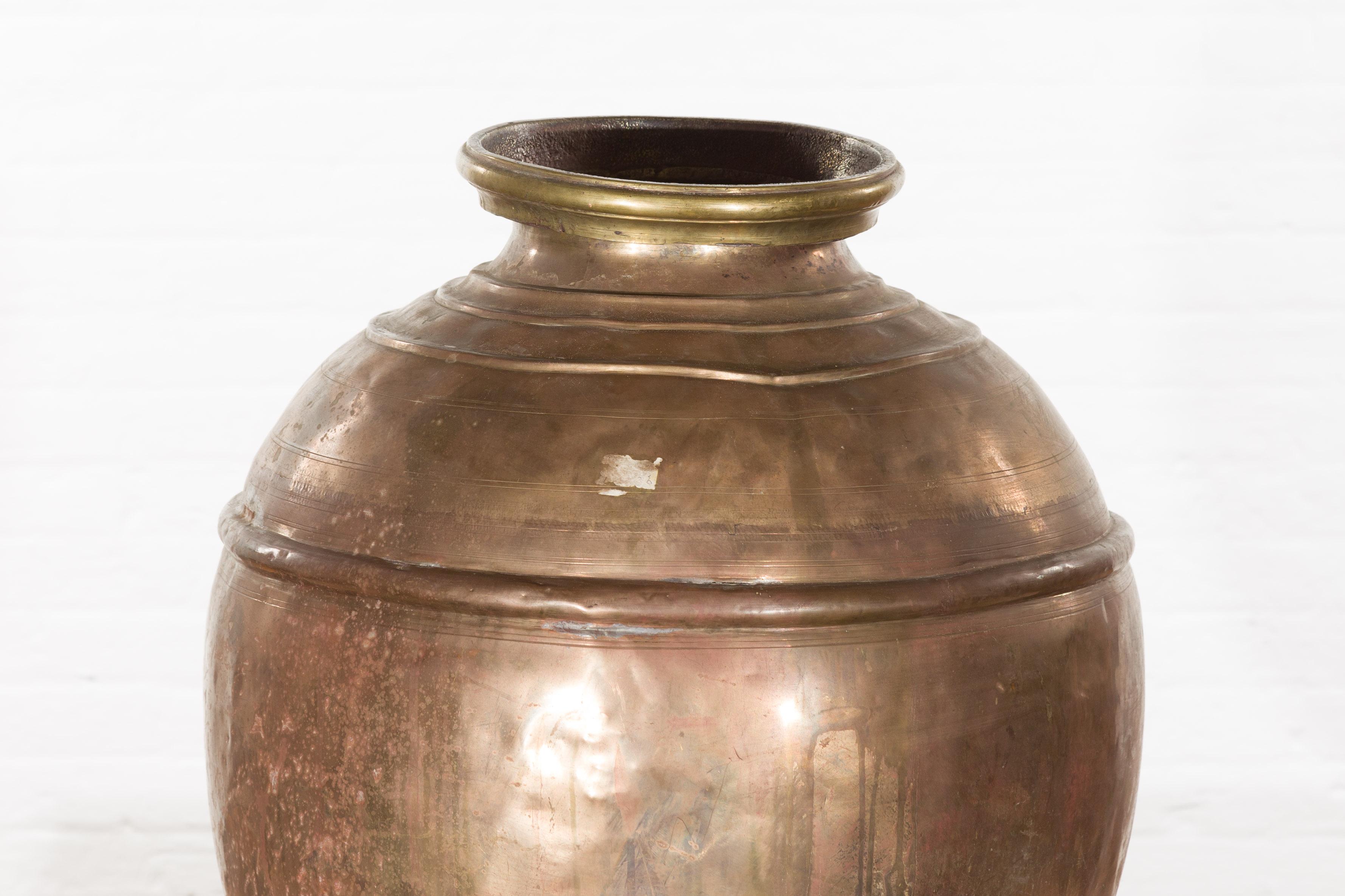 Indian Vintage Brass Water Jar with Concentric Rings and Distressed Appearance 3