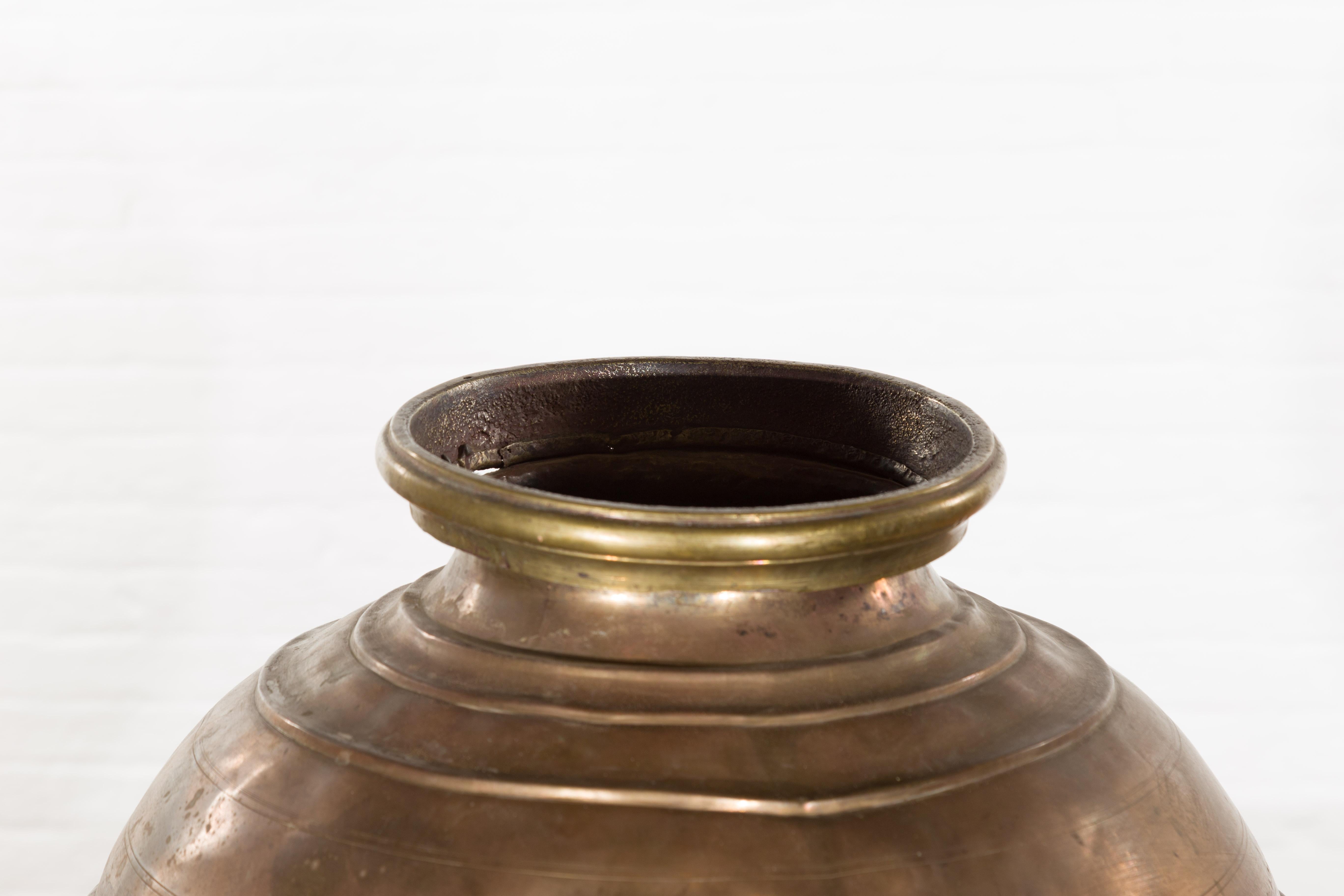 Indian Vintage Brass Water Jar with Concentric Rings and Distressed Appearance 4
