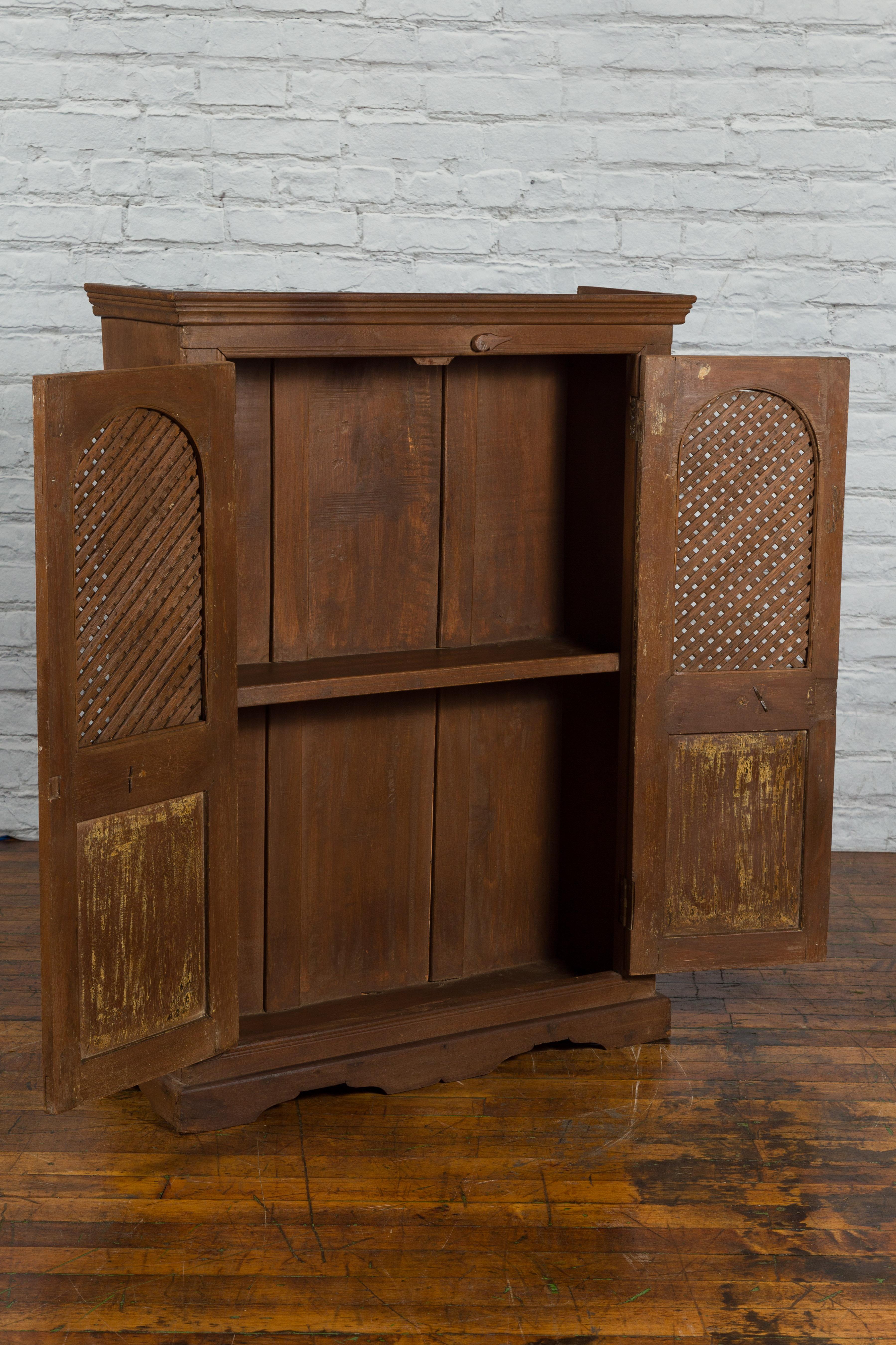 Indian Vintage Wooden Cabinet with Lattice Motifs and Carved Panels For Sale 7
