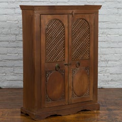 Indian Vintage Wooden Cabinet with Lattice Motifs and Carved Panels