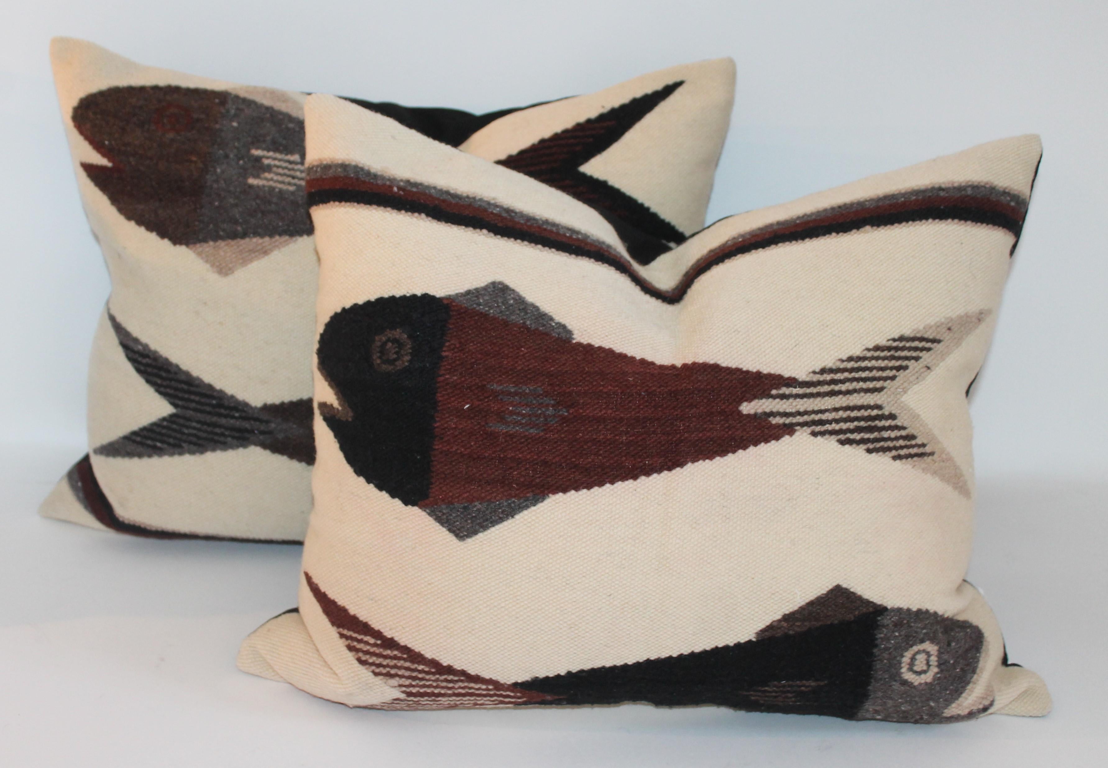 These cool American Indian weaving of pictorial fish pillows are in pristine condition. Sold as a pair for 1495 or 895. each. The backings are in black cotton linen.