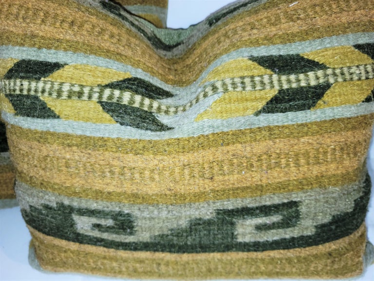 Indian Weaving pillows. Colors: Olive, green, taupe, dark mustard.
Feather and down insert. Zippered shams.