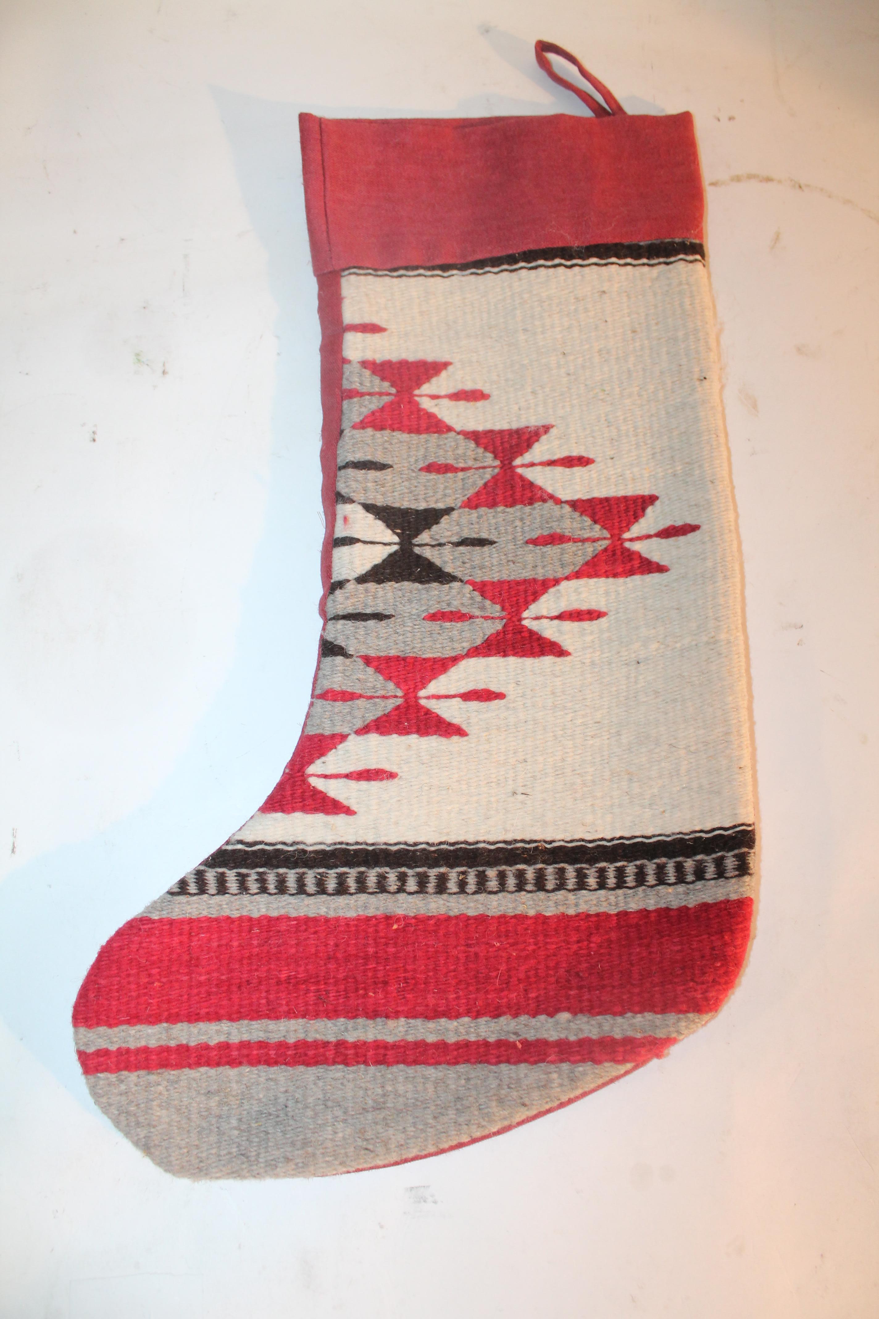 This fine pair of Indian weaving stockings have mauve cotton linen backings. The condition are very good.