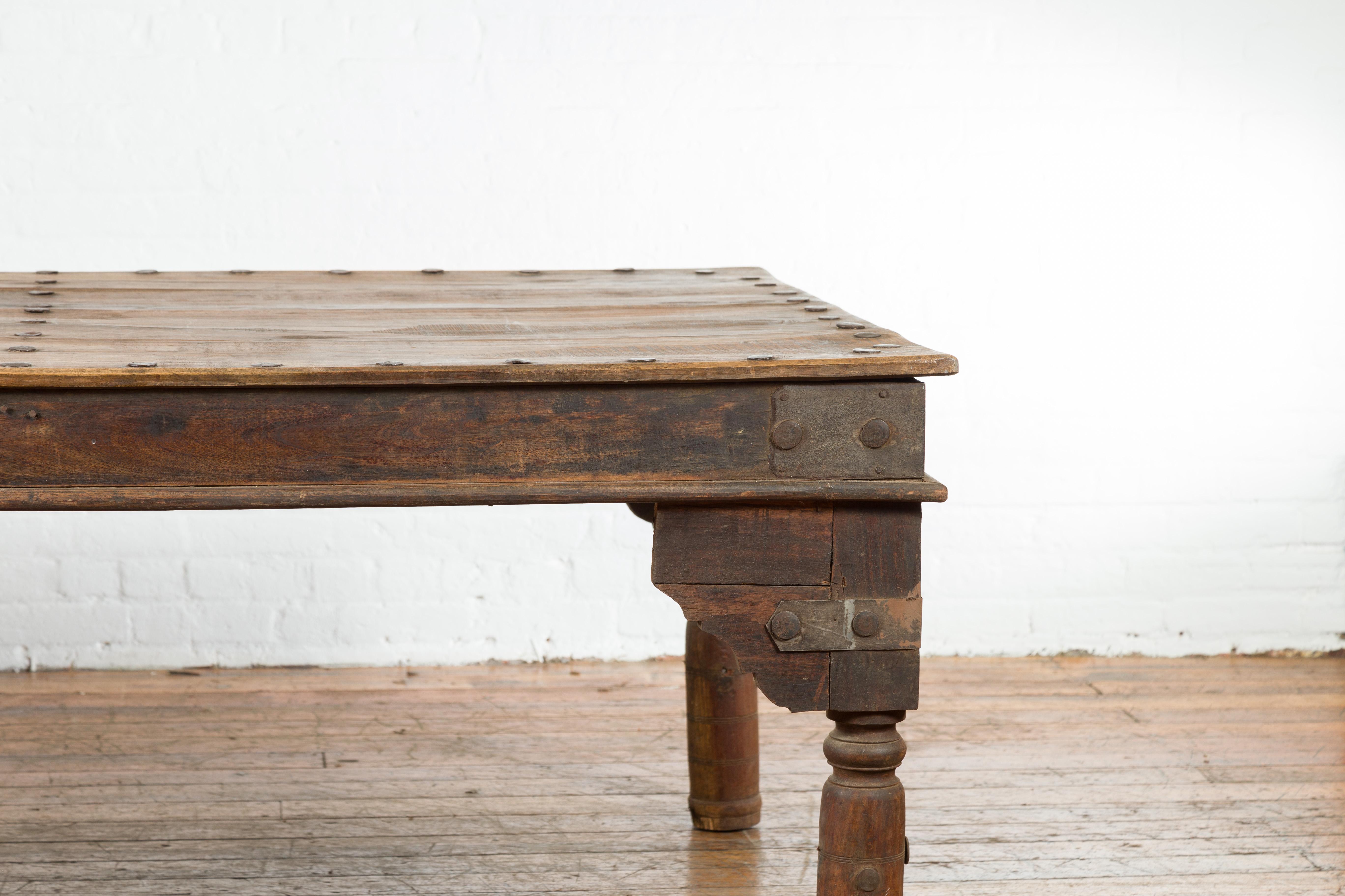 Rustic Indian Wood Dining Table with Distressed Patina, Iron Details and Baluster Legs For Sale