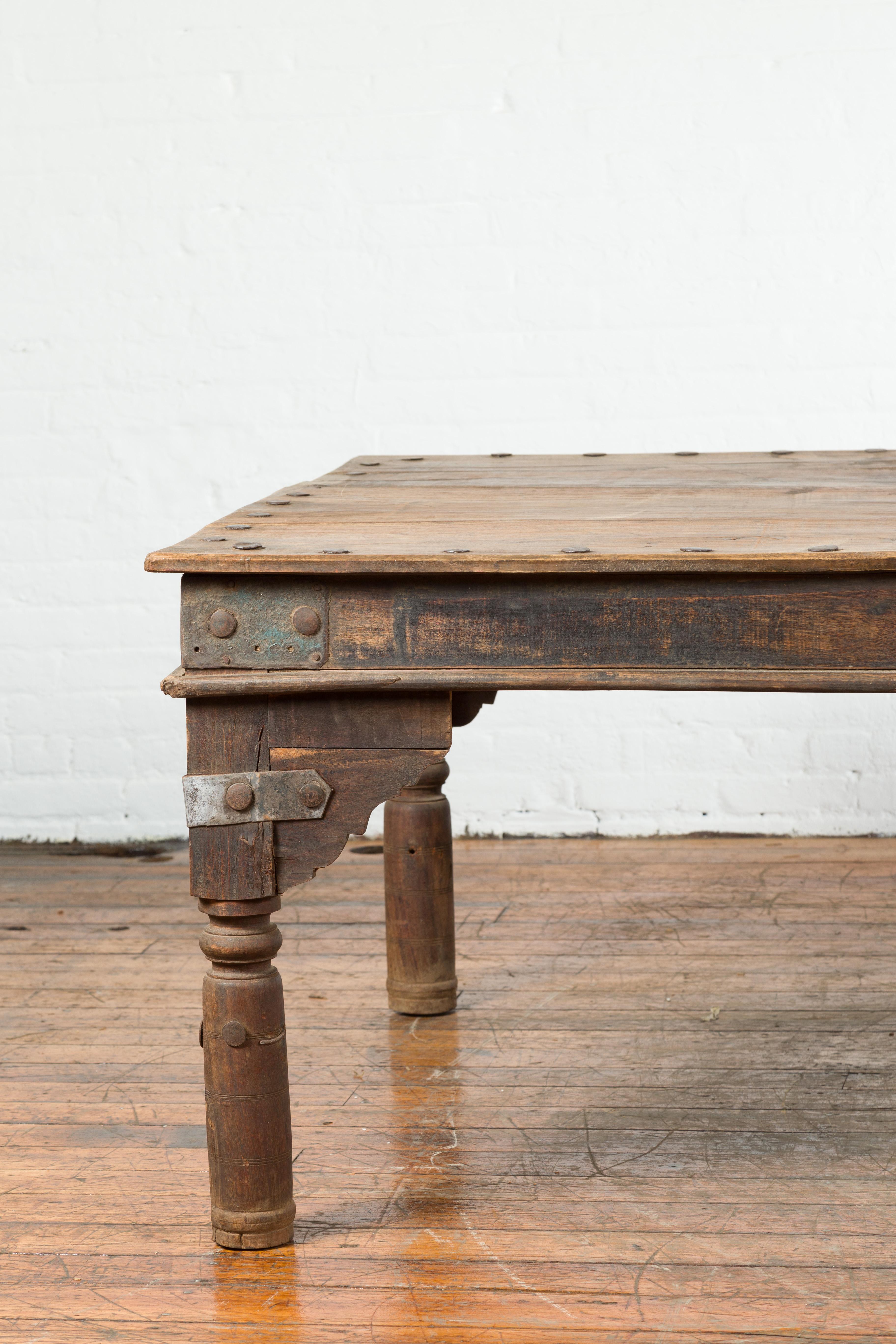 Indian Wood Dining Table with Distressed Patina, Iron Details and Baluster Legs In Good Condition For Sale In Yonkers, NY