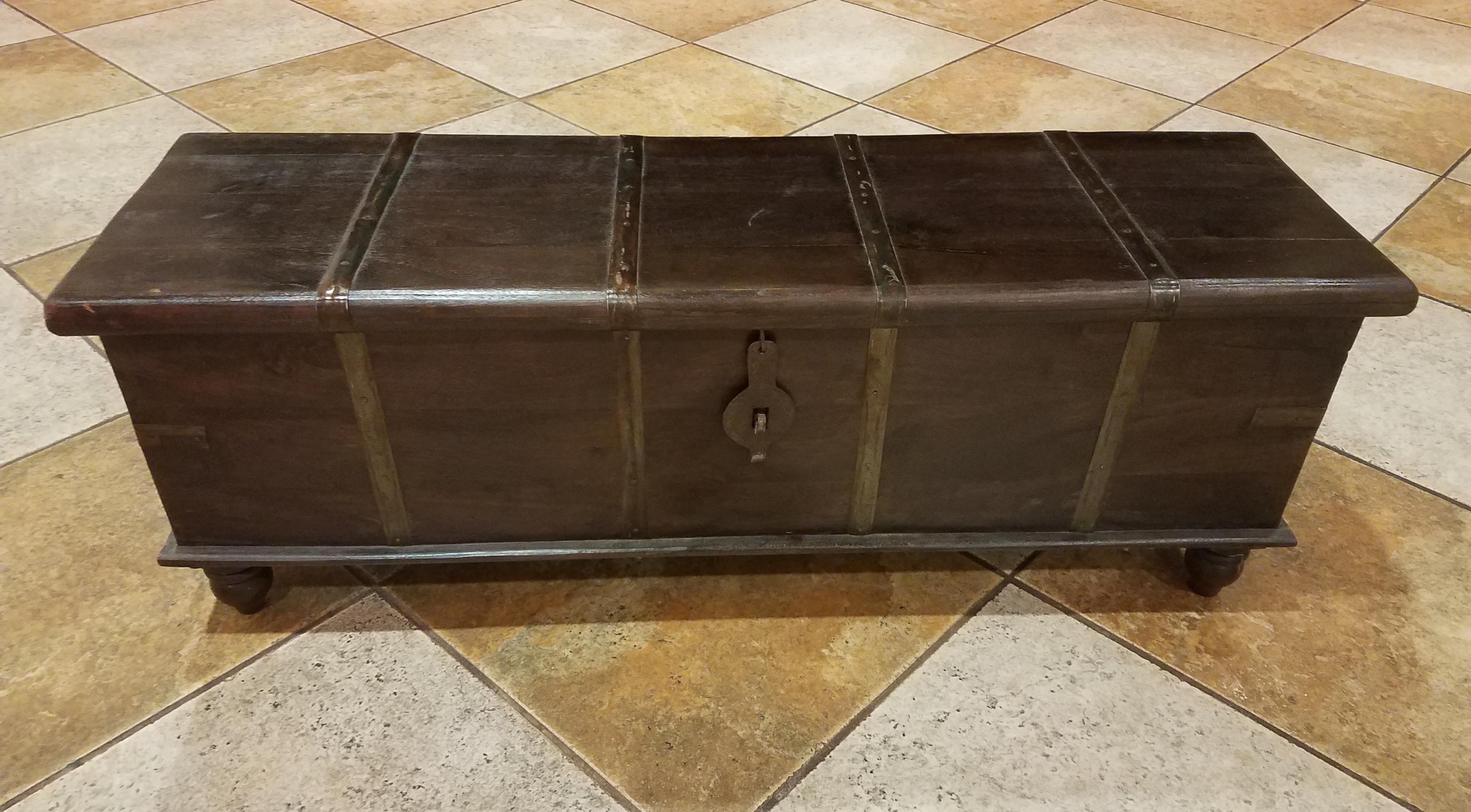We carry a wide range of beautiful trunks from many parts of the world. This one is a very solid teak wood trunk, with plenty of storage space, and can placed at the foot of a bed, can be used as a TV stand, aquarium support base, blanket chest, or