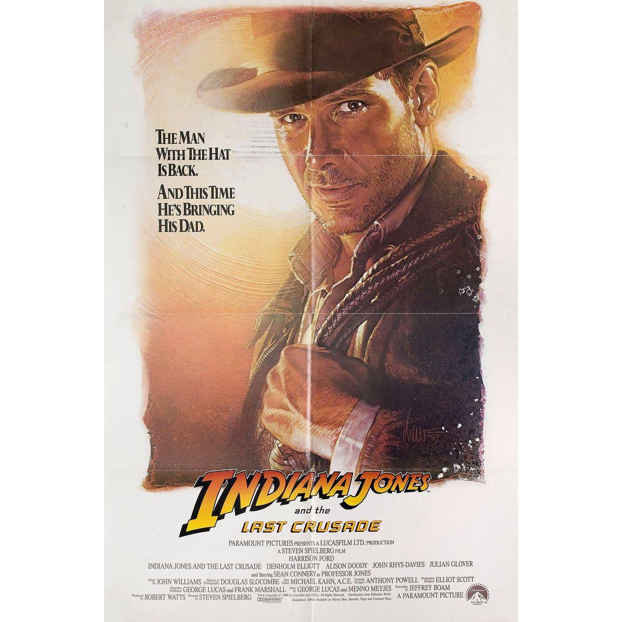 Original 1989 U.S. one sheet poster by Drew Struzan for the film 'Indiana Jones and the Last Crusade' directed by Steven Spielberg with Harrison Ford / Sean Connery / Denholm Elliott / Alison Doody. Very good-fine condition, folded with stamp on
