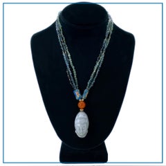 Collar de varias vueltas de turmalina indicolita y oro con jadeíta Guanyin