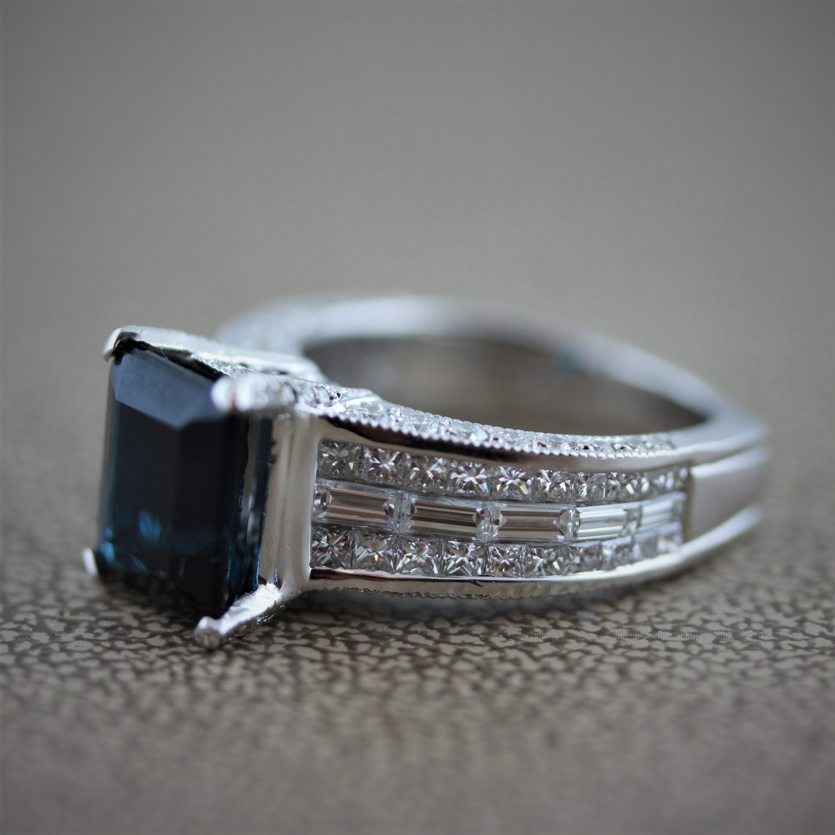 A rare blue colored tourmaline called “Indicolite” in the trade is featured in exquisite ring. It weighs 3.86 carats and is cut as an emerald cut. Adding to the indicolite are 2.52 carats of round brilliant cuts, baguette cuts and princess cut