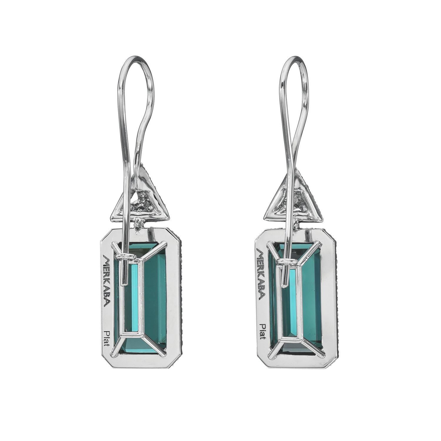 Exceptional 9.87 carat Indicolite Tourmaline emerald-cut platinum earrings, decorated with a total of 0.64 carat collection round single-cut diamonds, suspending from our signature three dimensional triangle diamond studs. Machine-cut fine