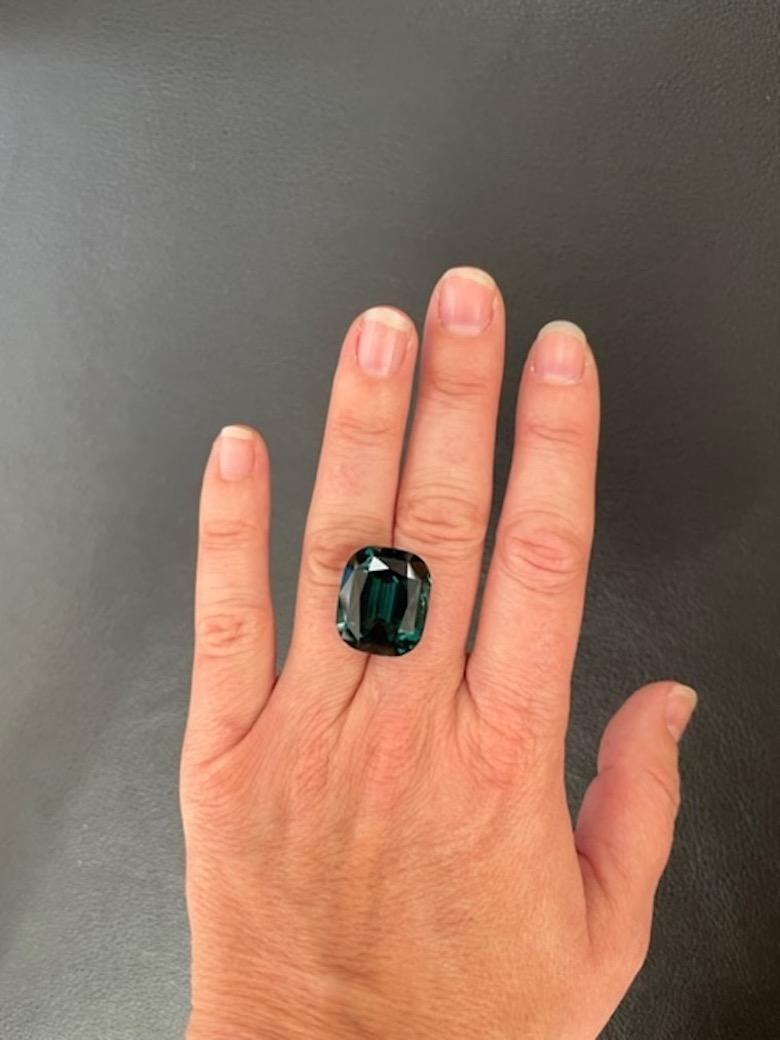 Exceptional 28.05-Carat Exotic Indicolite Tourmaline Gem – Design Your Dream Statement Necklace By Merkaba Jewelry Beverly Hills. 

Presenting the extraordinary 28.05-carat exotic Indicolite Tourmaline, a rare and captivating gemstone offered