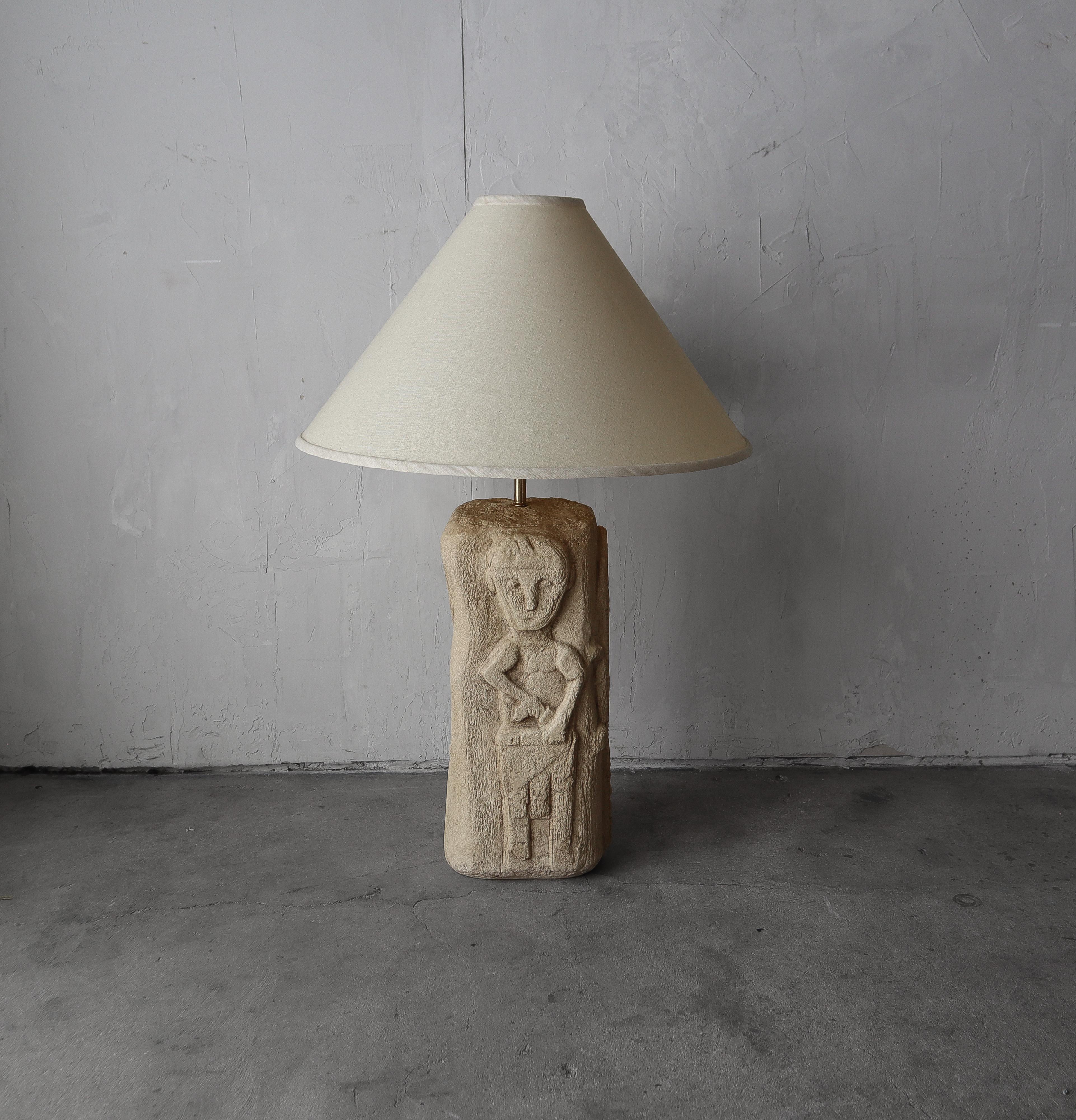 Large solid and very HEAVY ceramic table lamp with indigenous tribal theme depicted in dimensional symbolic imagery.  A truly bespoke piece.

Lamp is in excellent, working condition with no imperfections to be noted.