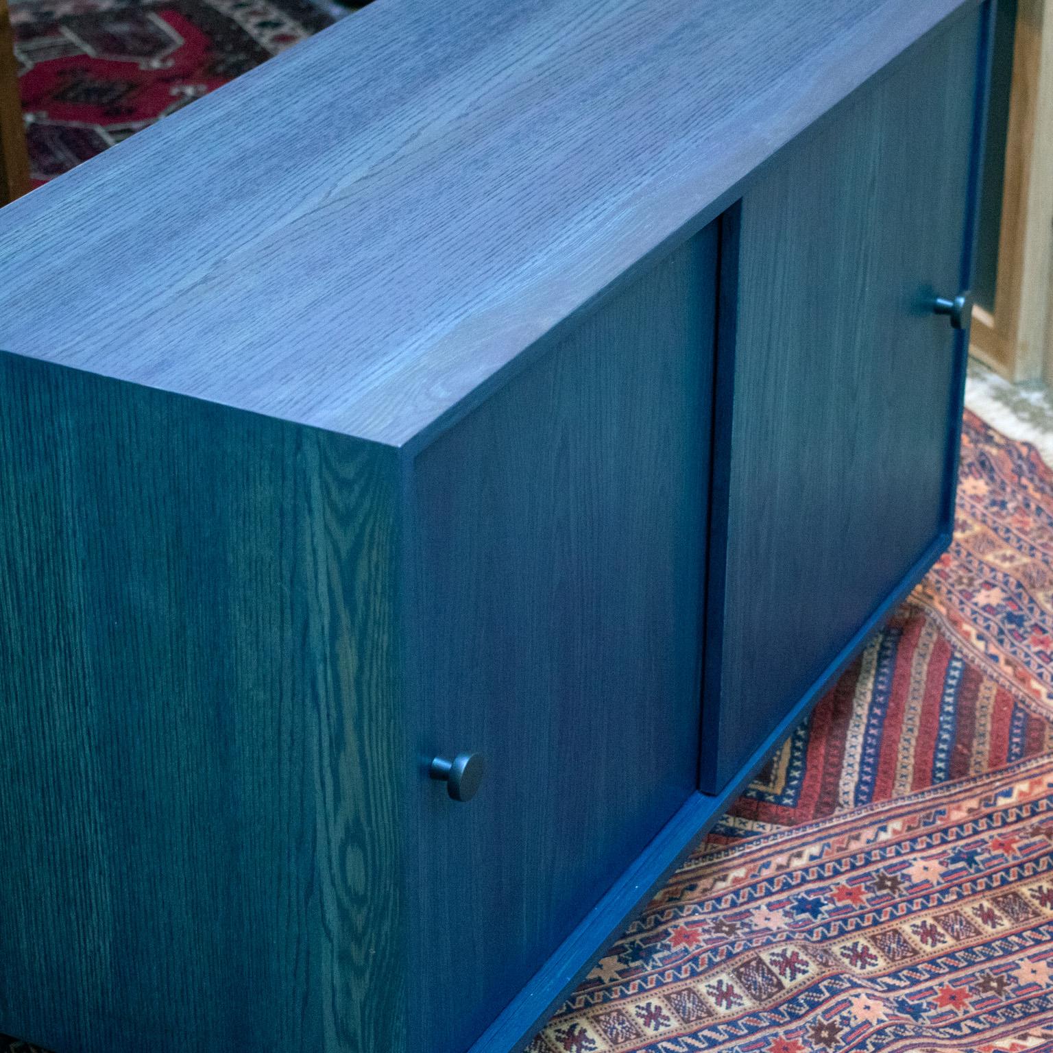 Canadian Indigo Blue Oak Aquinas Sliding Door Cabinet For Sale