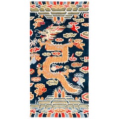 Tapis dragon tibétain en laine bleu indigo:: rouge:: vert et orange