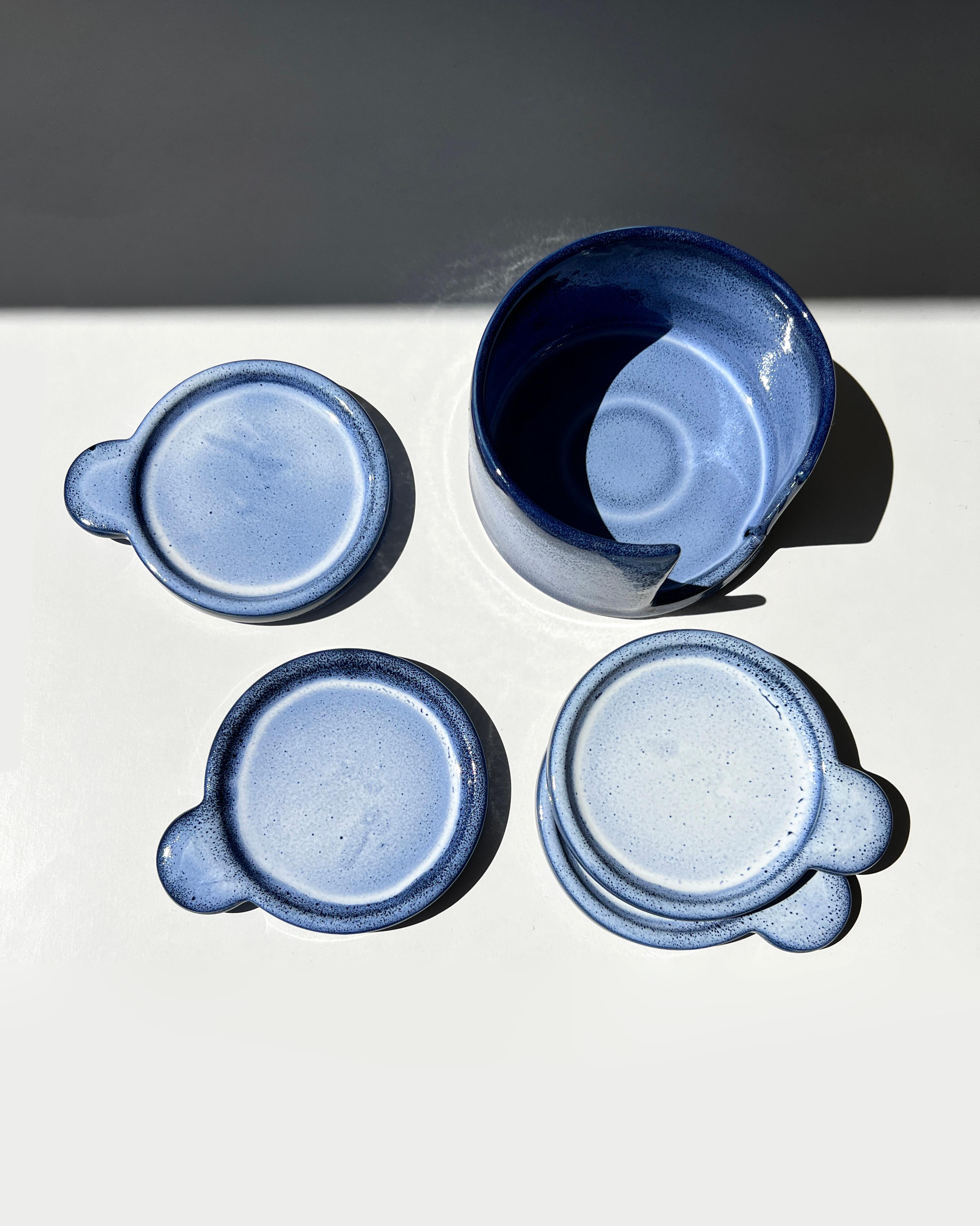 The perfect set of plates for Tapas Night. Handcrafted by skilled artisans in Mexico, the Anna Indigo Handmade Tapas Plate Set is the perfect addition to any modern home. With a beautiful indigo blue and white glaze, these rustic plates are perfect