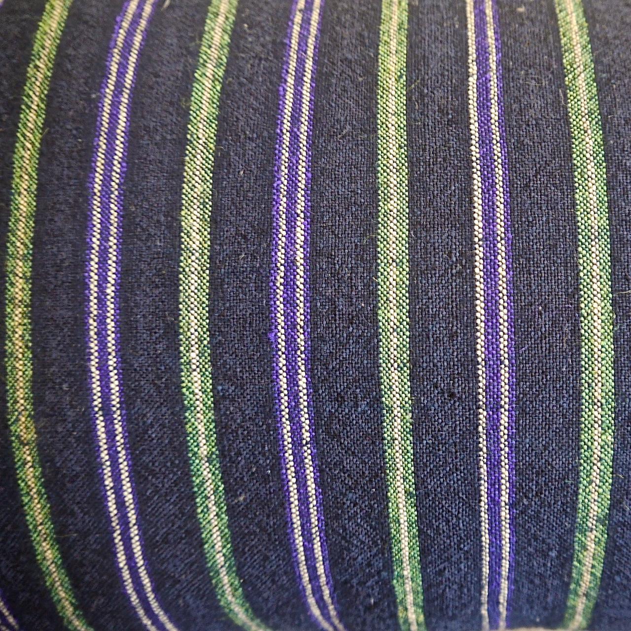 French 19th century woven cotton and wool striped cushion of dark indigo with white, green and purple colours. Original piece made with an 'as found ' border on one side of a French 19th century cotton check. Self backed and slip-stitched closed