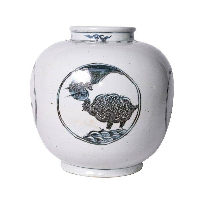 Indigo Porcelain Medallion Jar Crane Turtle Motif

The special antique process makes it looks like a piece of art from a museum. 
High fire porcelain, 100% hand shaped, hand painted. Distress, chips and other imperfections create great characters