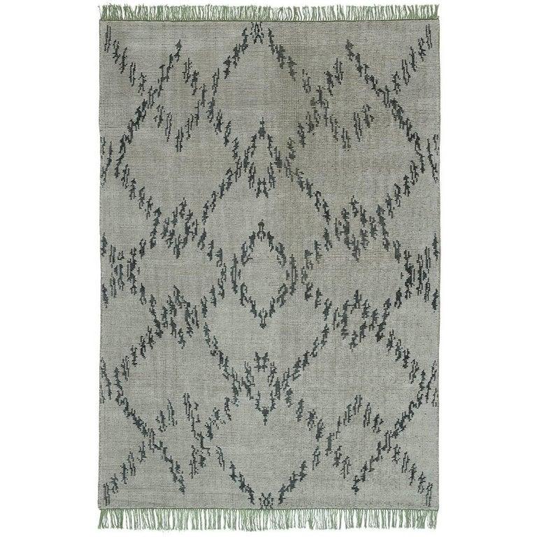 This striking rug designed by Stefania Crippa is inspired by the ancient Japanese Kasuri and the tribal geometries of African art. The old soul of this piece features natural colors that are soft and vibrant. The base was embroidered with