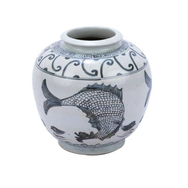 Indigo Yuan Fish Open Top Porcelain Jar

The special antique process makes it looks like a piece of art from a museum. 
High fire porcelain, 100% hand shaped, hand painted. Distress, chips and other imperfections create great characters of this
